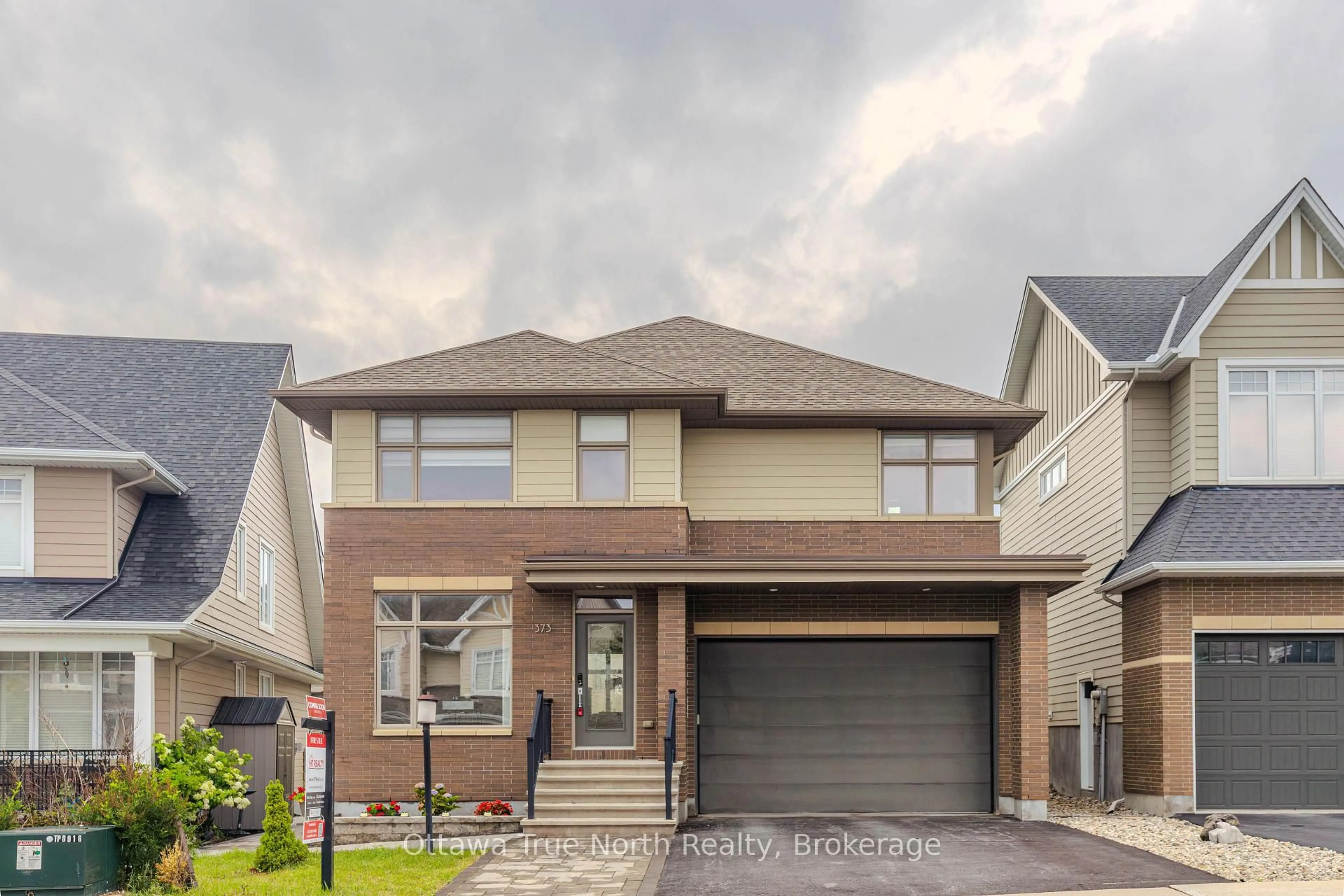 Home with brick exterior material, street for 373 Huntsville Dr, Ottawa Ontario K2T 0H5
