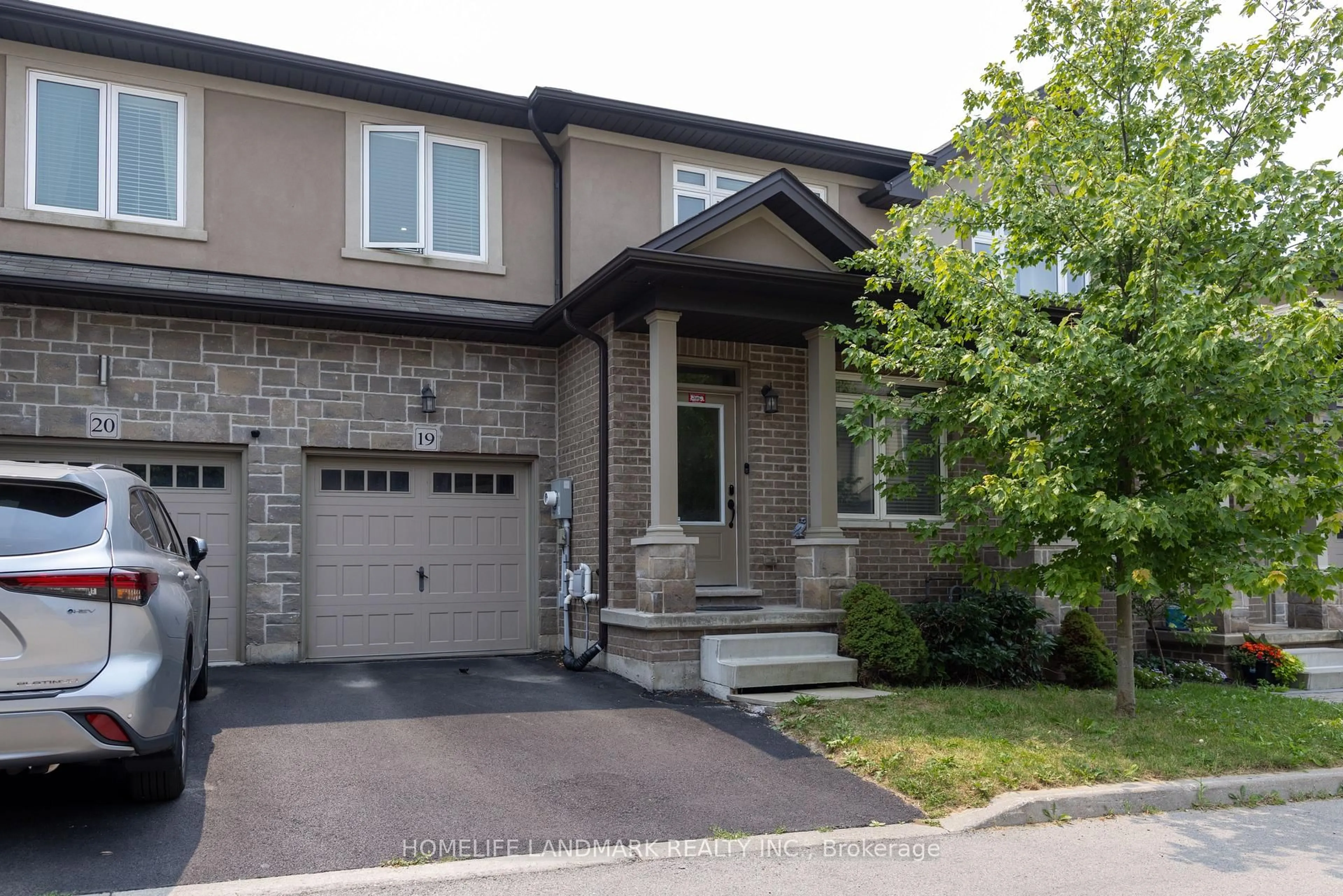 Home with brick exterior material, street for 421 Kitty Murray Lane #19, Hamilton Ontario L9G 3K9