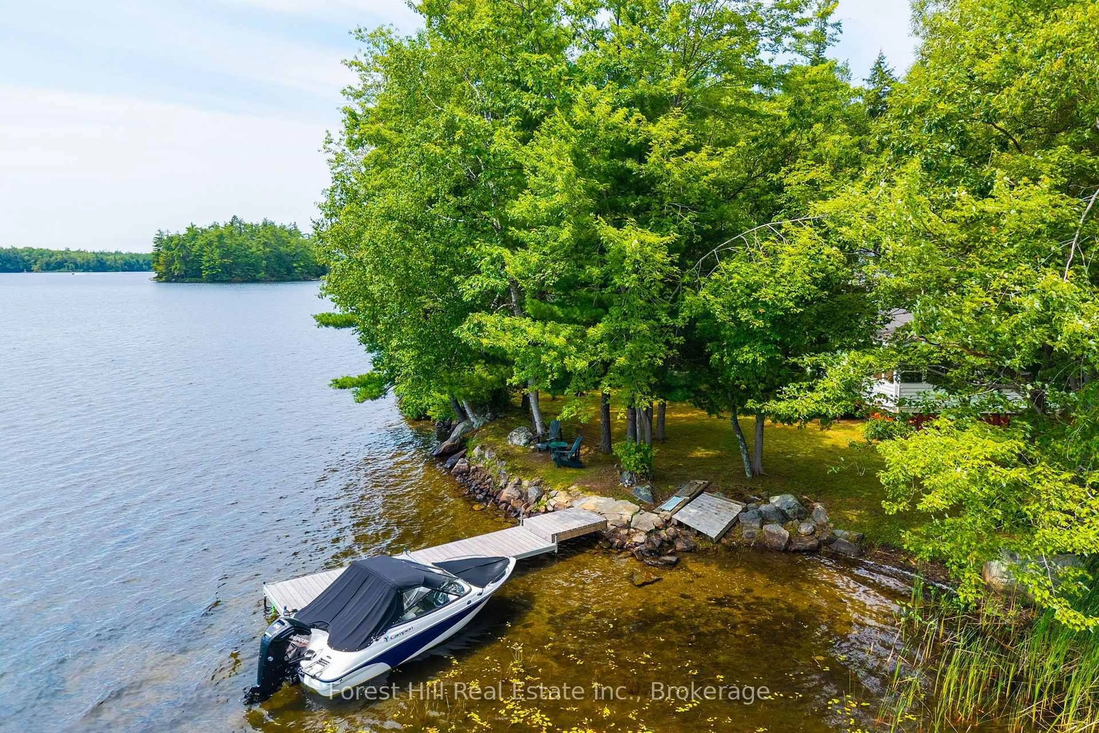 A pic from outside/outdoor area/front of a property/back of a property/a pic from drone, water/lake/river/ocean view for 2871 Muskoka Road 169 Rd #Unit 1, Muskoka Lakes Ontario P0C 1A0