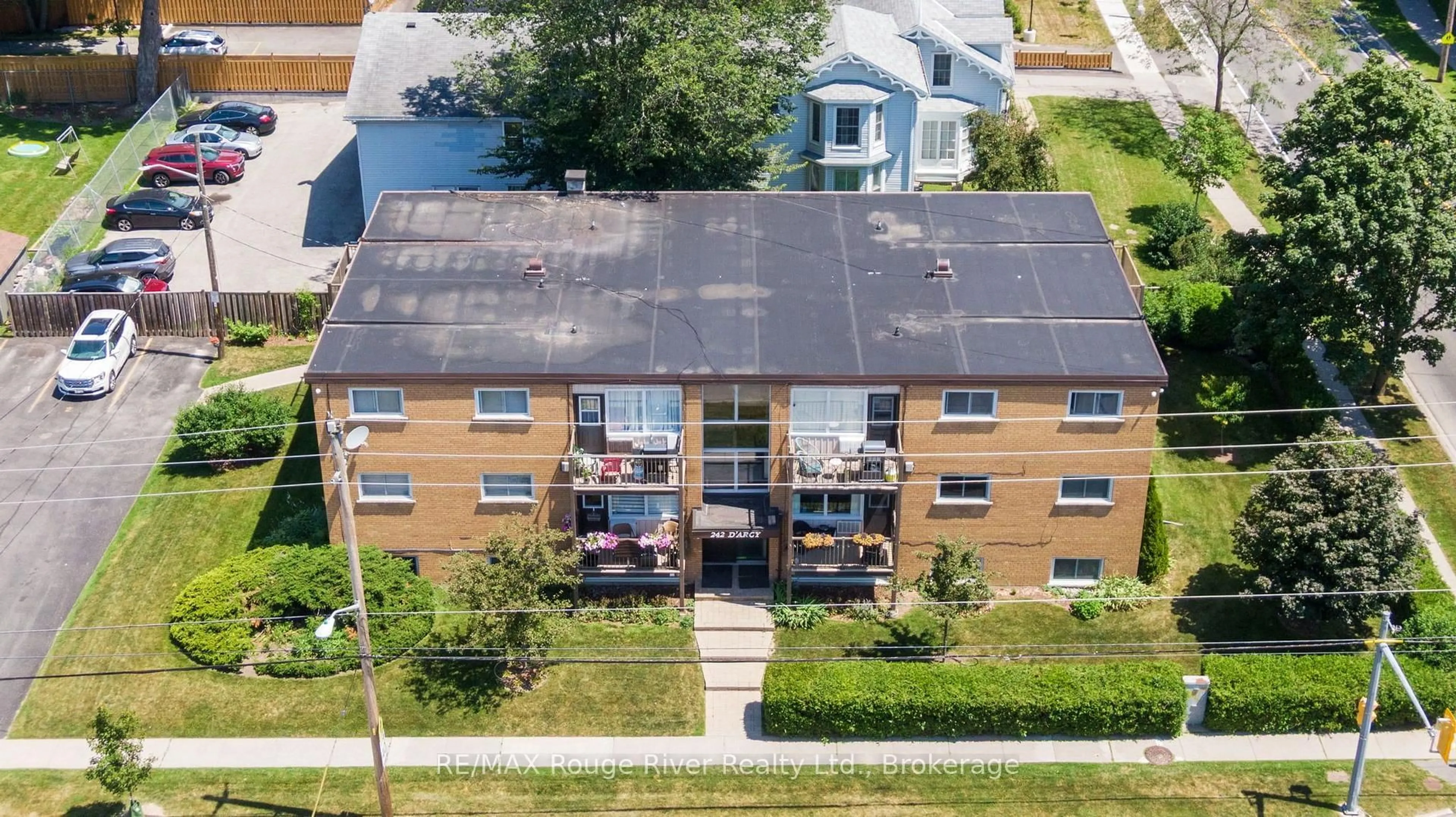 A pic from outside/outdoor area/front of a property/back of a property/a pic from drone, building for 242 Darcy St #11, Cobourg Ontario K9A 4A3