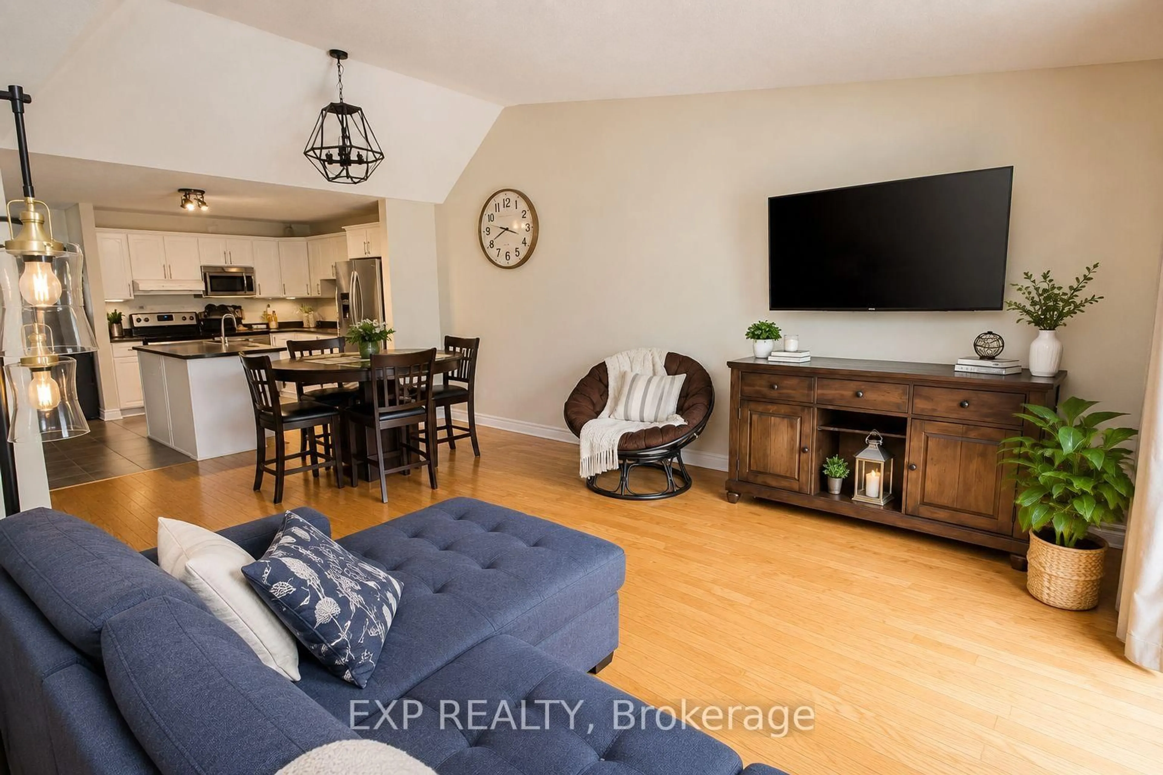 Living room with furniture, wood/laminate floor for 127 Third St #2, Cornwall Ontario K6J 2N9