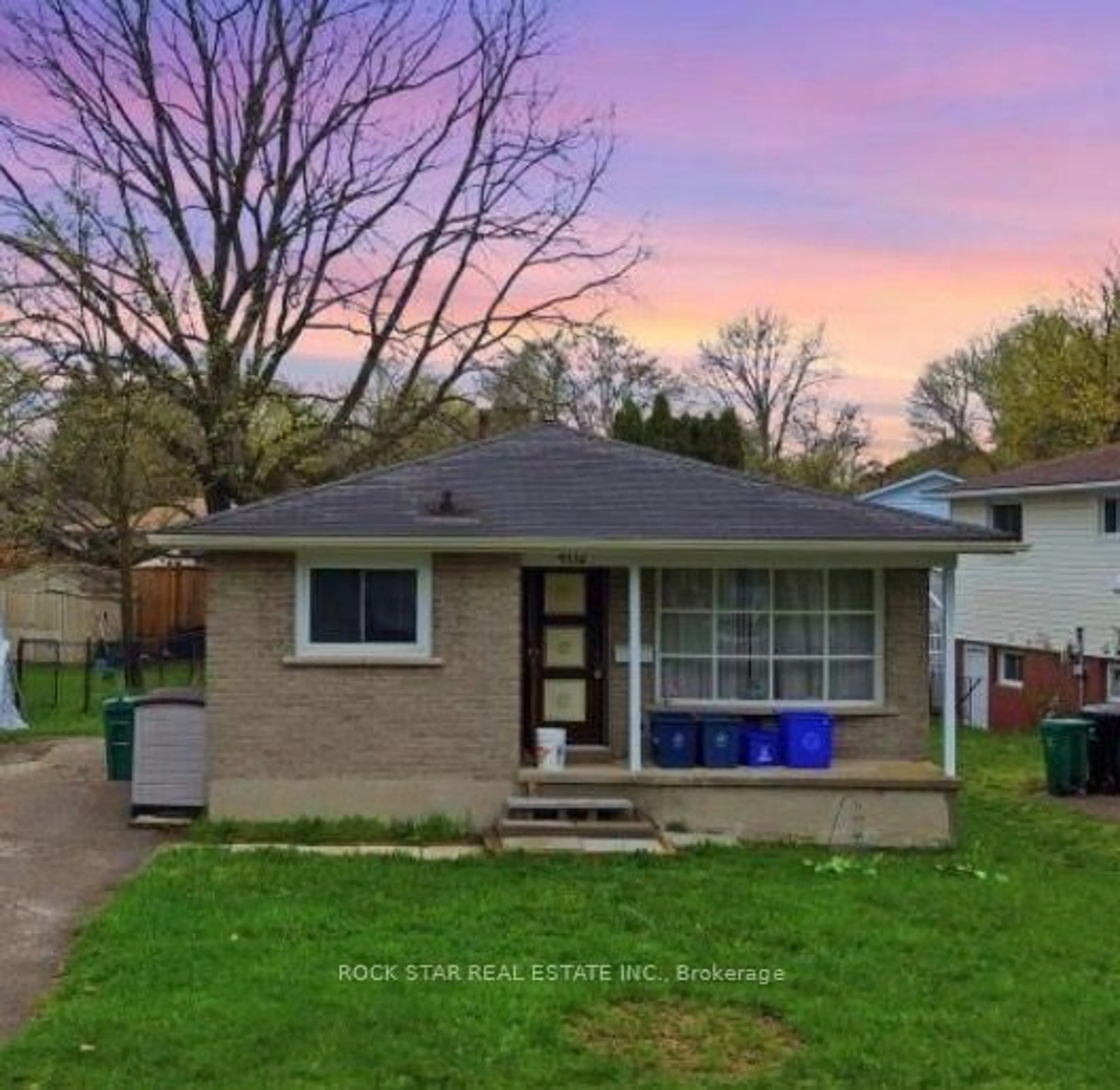 Home with brick exterior material, street for 402 Midwood Cres, Waterloo Ontario N2L 5N5