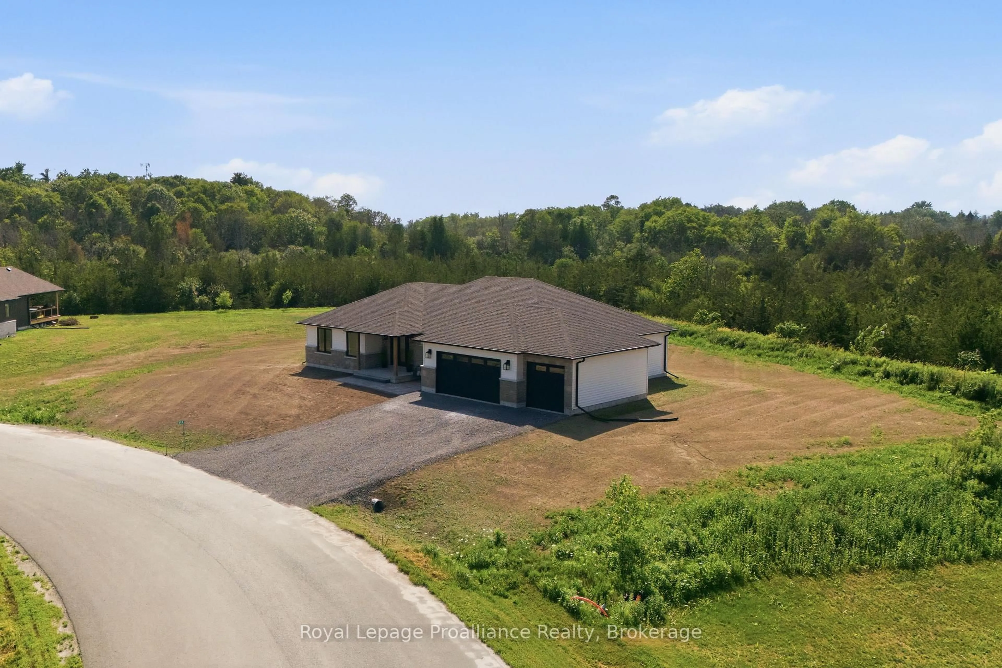 A pic from outside/outdoor area/front of a property/back of a property/a pic from drone, unknown for 393 Michael's Way, Prince Edward County Ontario K0K 1L0