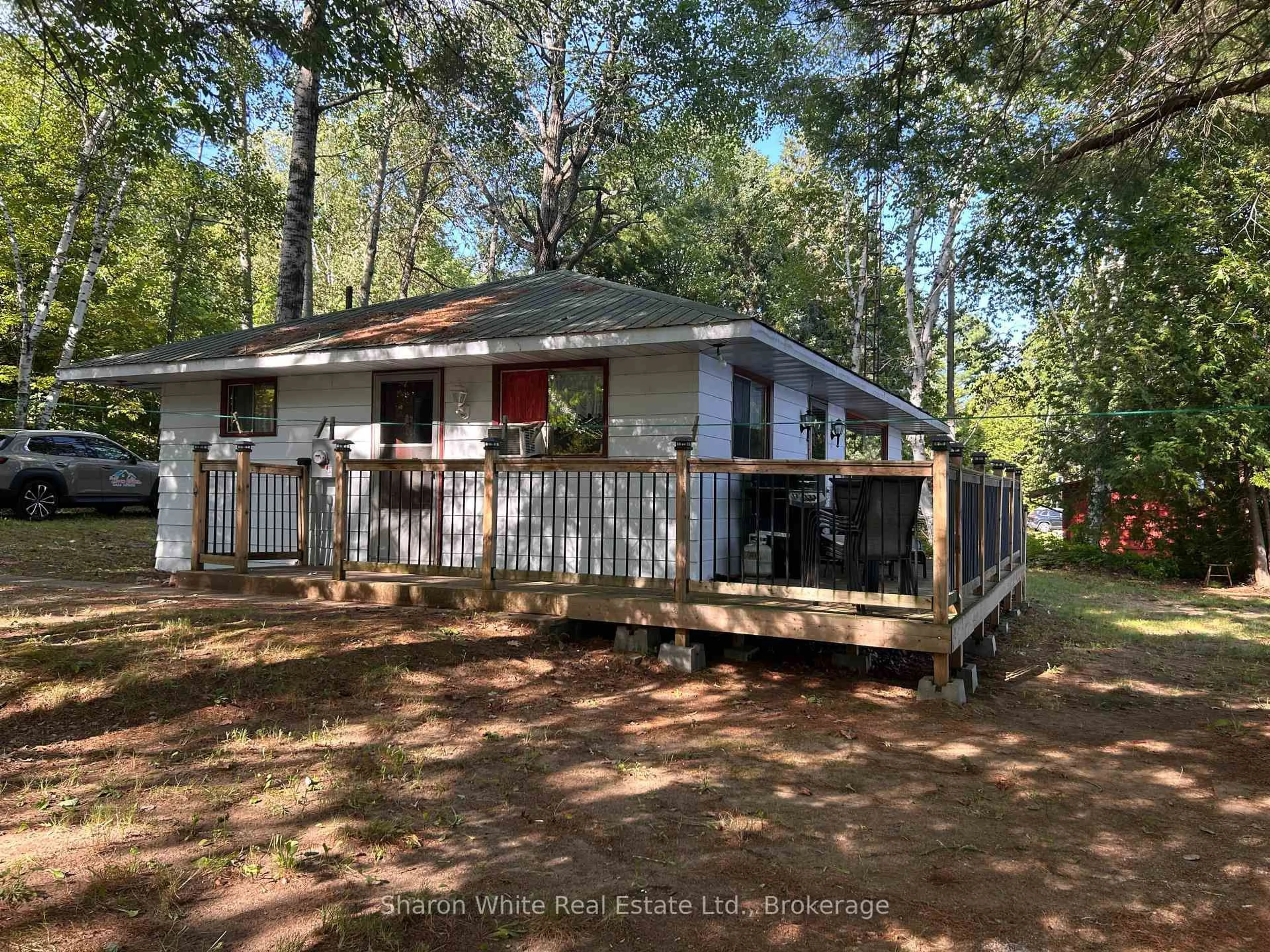 A pic from outside/outdoor area/front of a property/back of a property/a pic from drone, forest/trees view for 15 Russell Cres, Bancroft Ontario K0L 1C0
