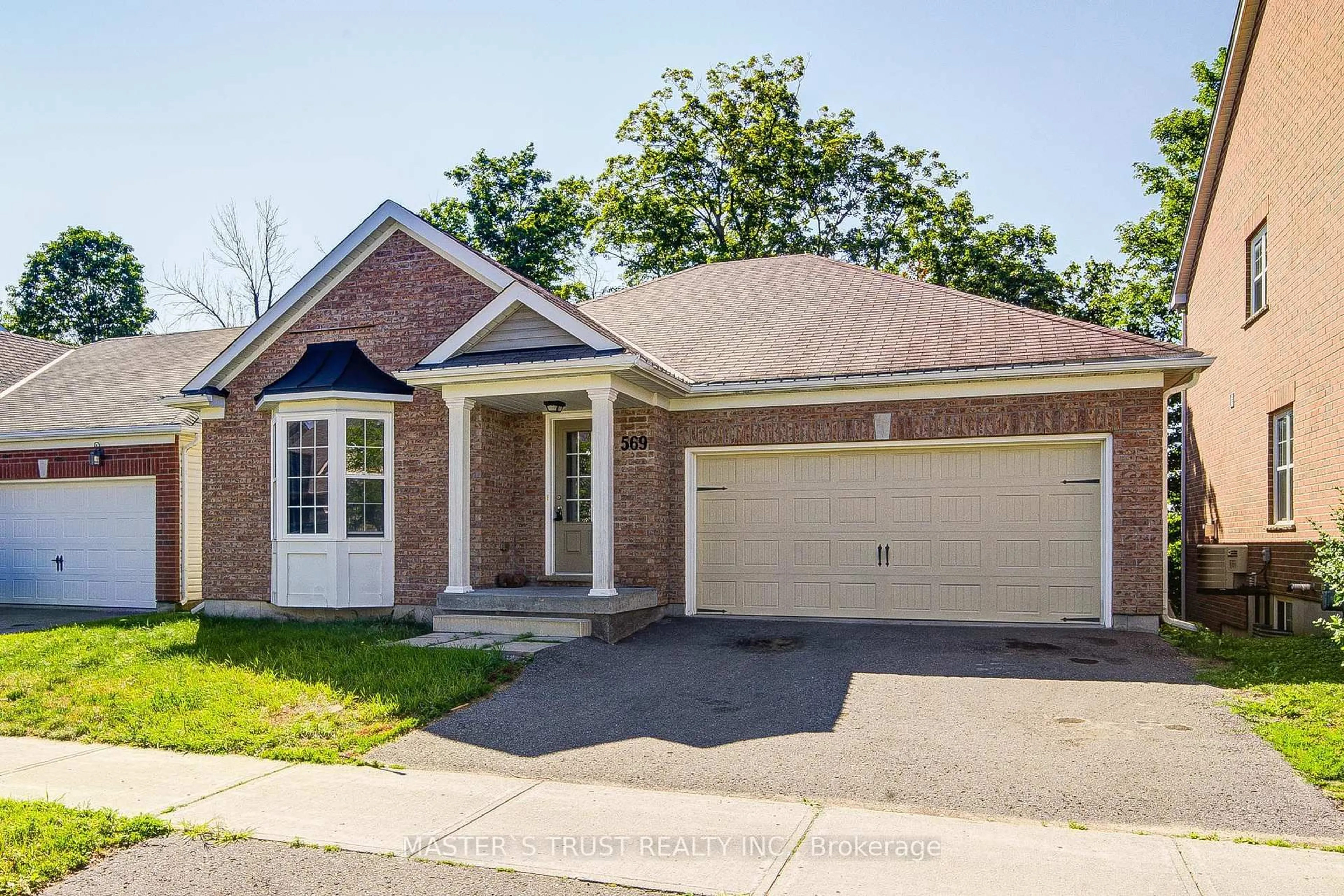 Home with brick exterior material, street for 569 Grange Way, Peterborough Ontario N1E 7C9