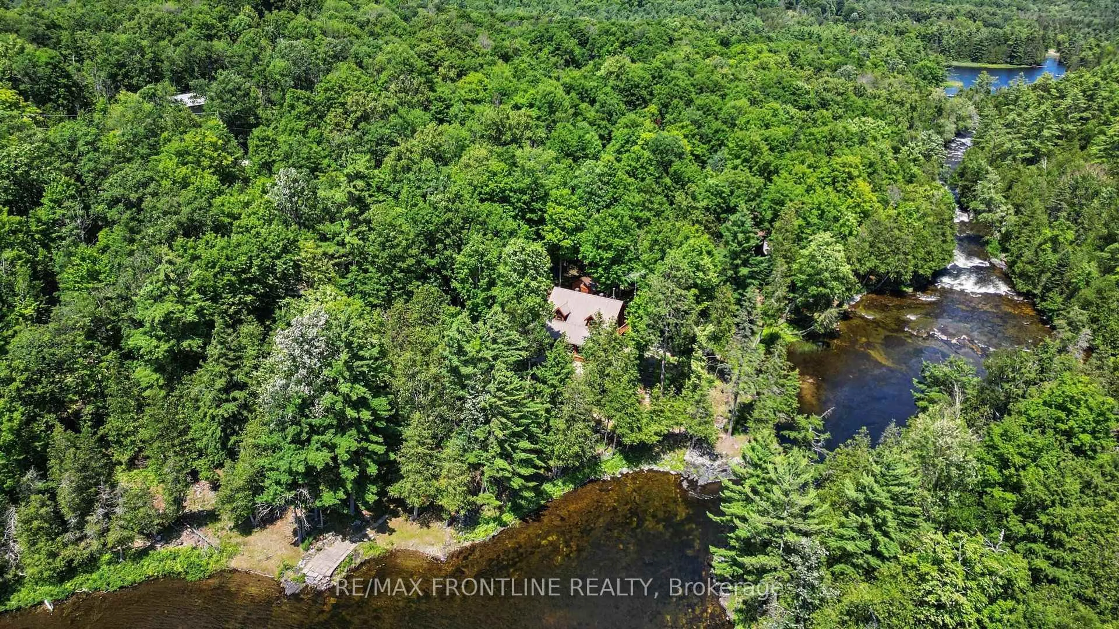 A pic from outside/outdoor area/front of a property/back of a property/a pic from drone, water/lake/river/ocean view for 1169 Carson Tr, Mcdonalds Corners Ontario K0G 1M0