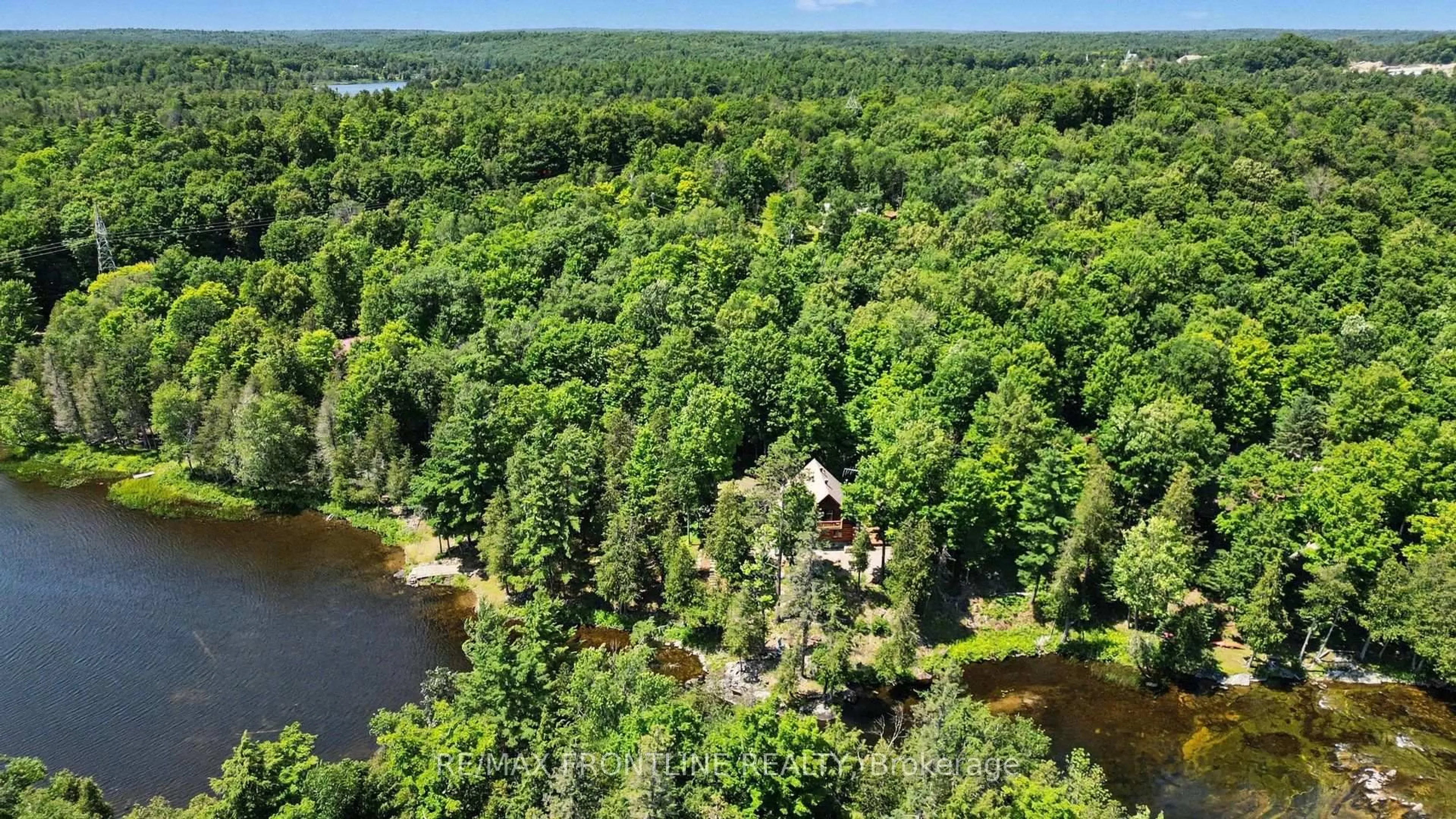 A pic from outside/outdoor area/front of a property/back of a property/a pic from drone, water/lake/river/ocean view for 1169 Carson Tr, Mcdonalds Corners Ontario K0G 1M0