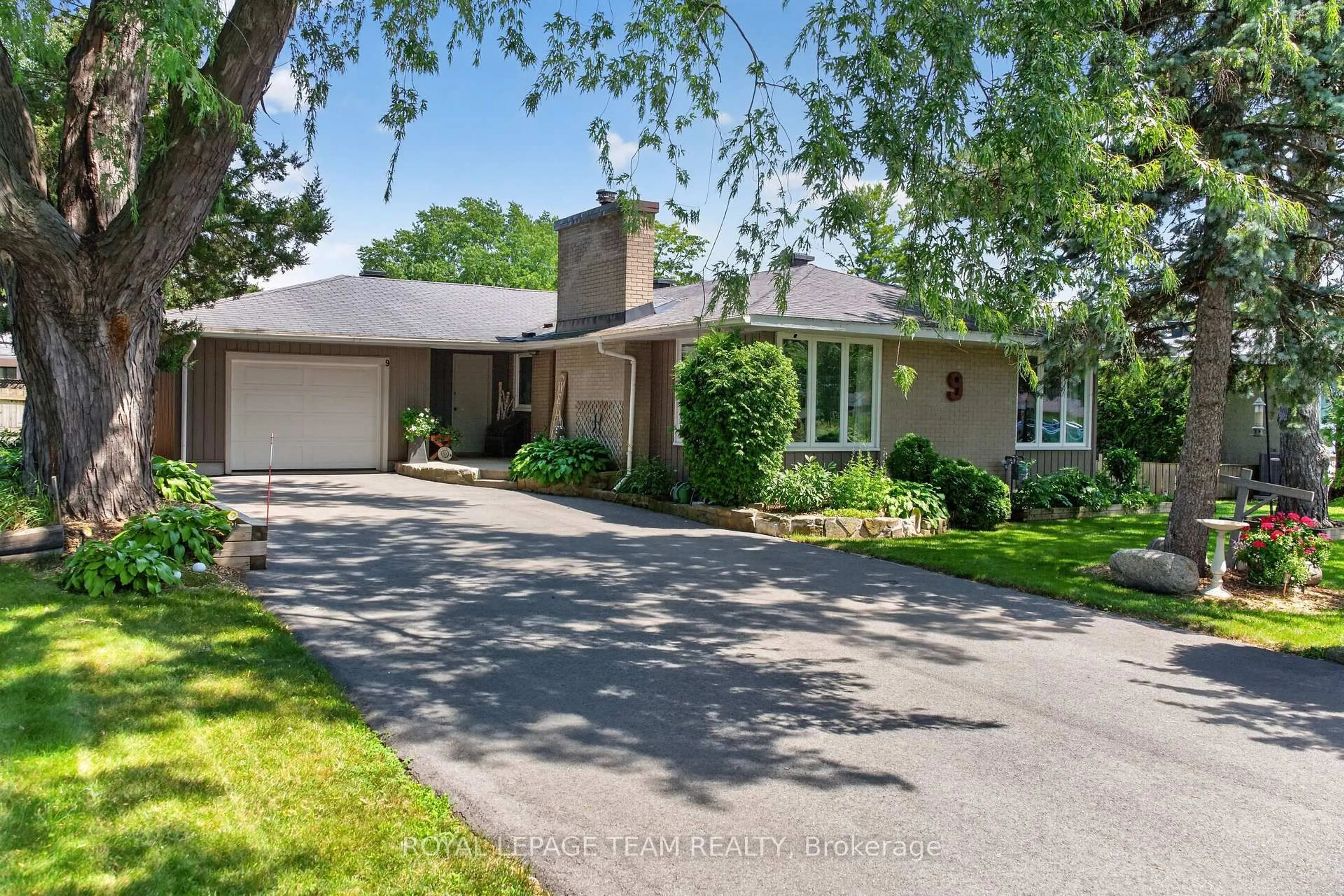 Home with brick exterior material, street for 9 Laurentide Rd, Ottawa Ontario K2H 6T6