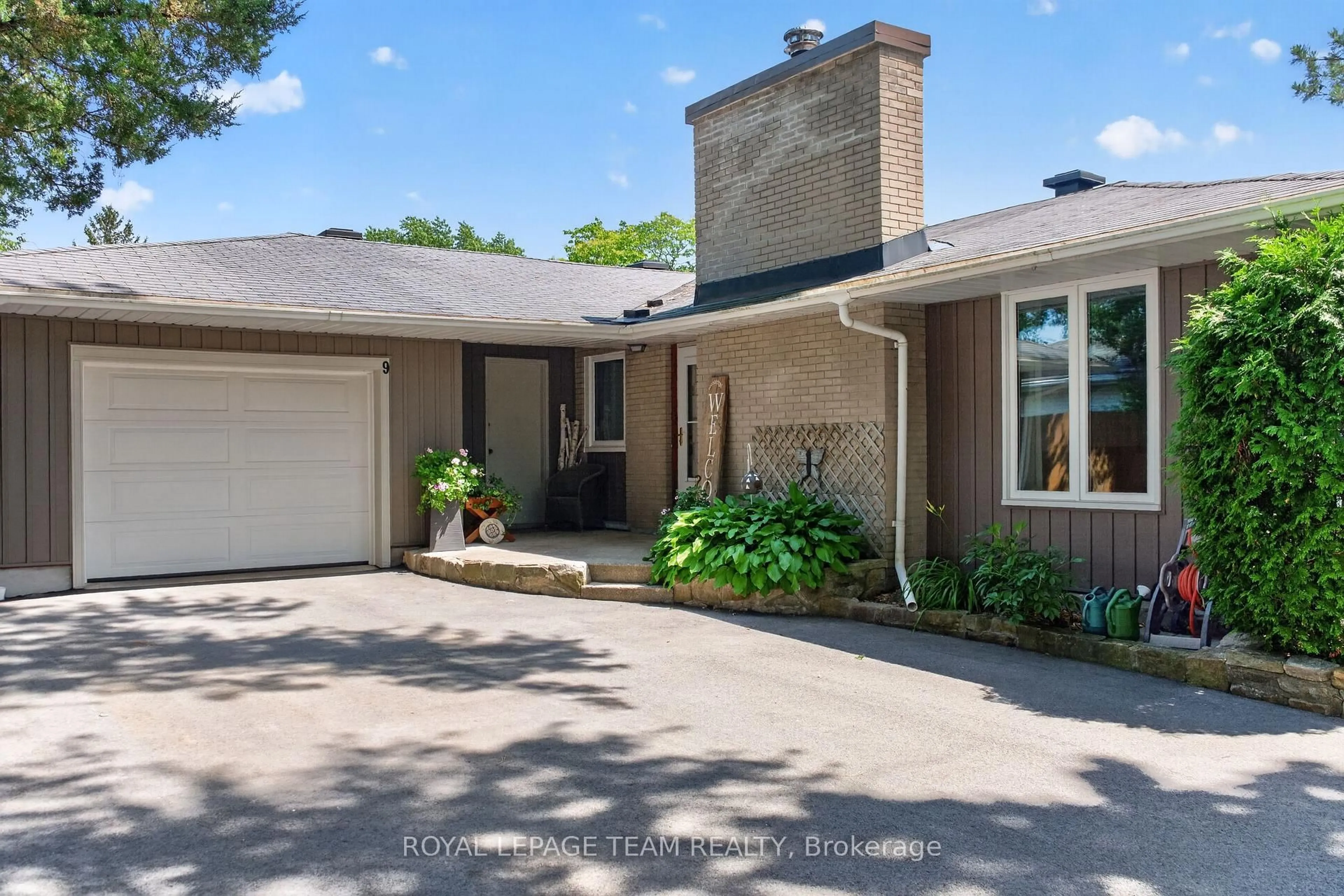 Home with brick exterior material, street for 9 Laurentide Rd, Ottawa Ontario K2H 6T6