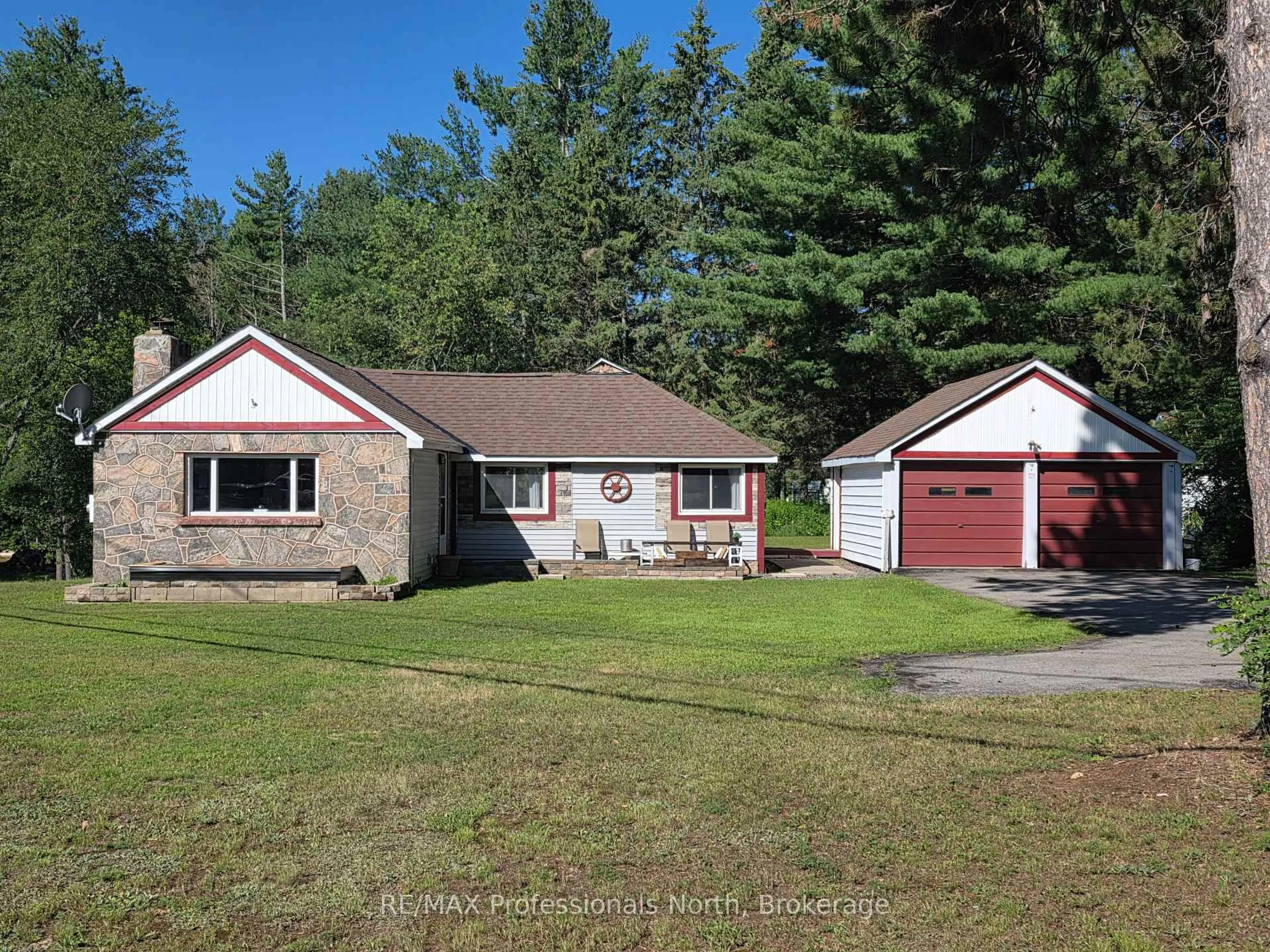 A pic from outside/outdoor area/front of a property/back of a property/a pic from drone, street for 1007 West Rd, Minden Hills Ontario K0M 2K0