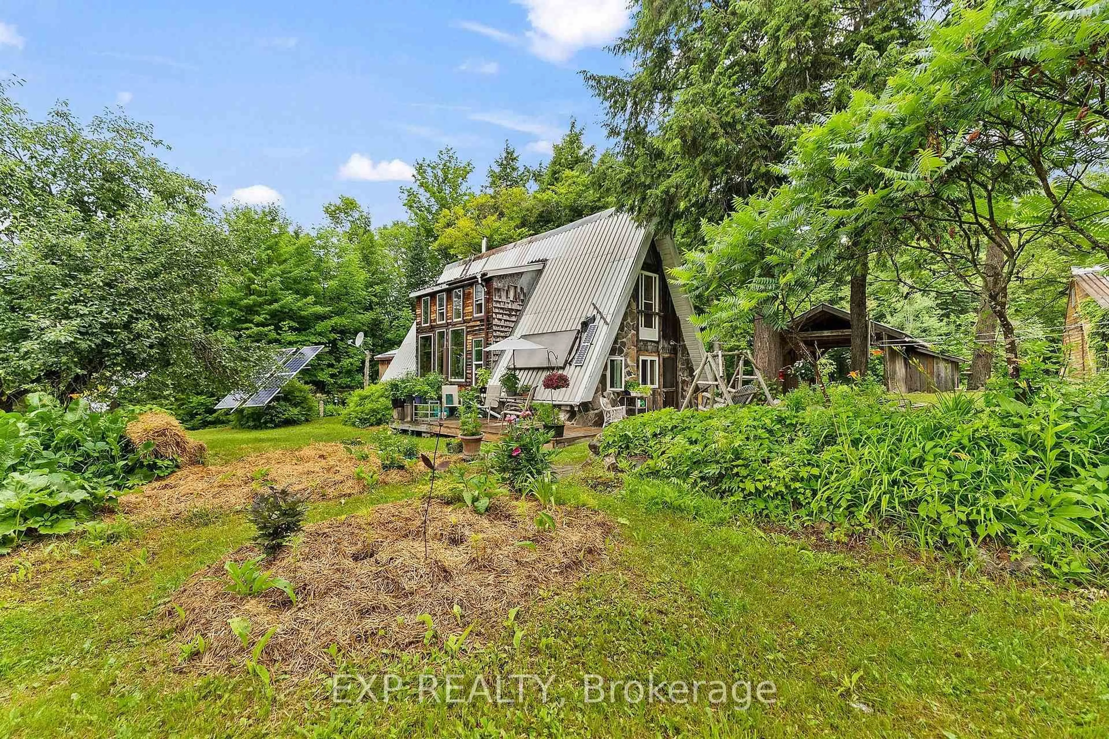 A pic from outside/outdoor area/front of a property/back of a property/a pic from drone, water/lake/river/ocean view for 387A Sunny Hill Rd, Barry's Bay Ontario K0J 1B0