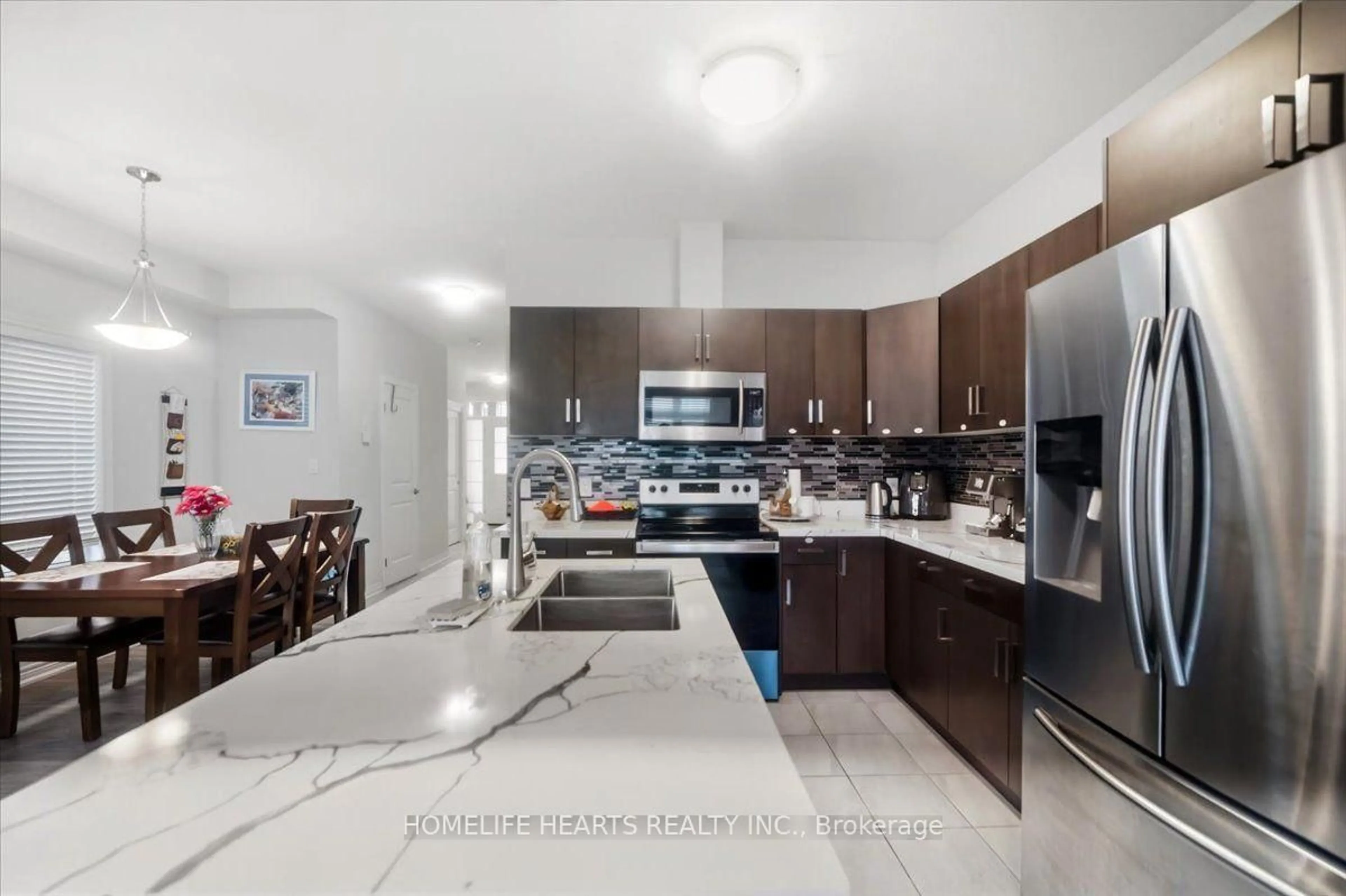 Open concept kitchen, ceramic/tile floor for 9561 Tallgrass Ave, Niagara Falls Ontario L2G 0Y3