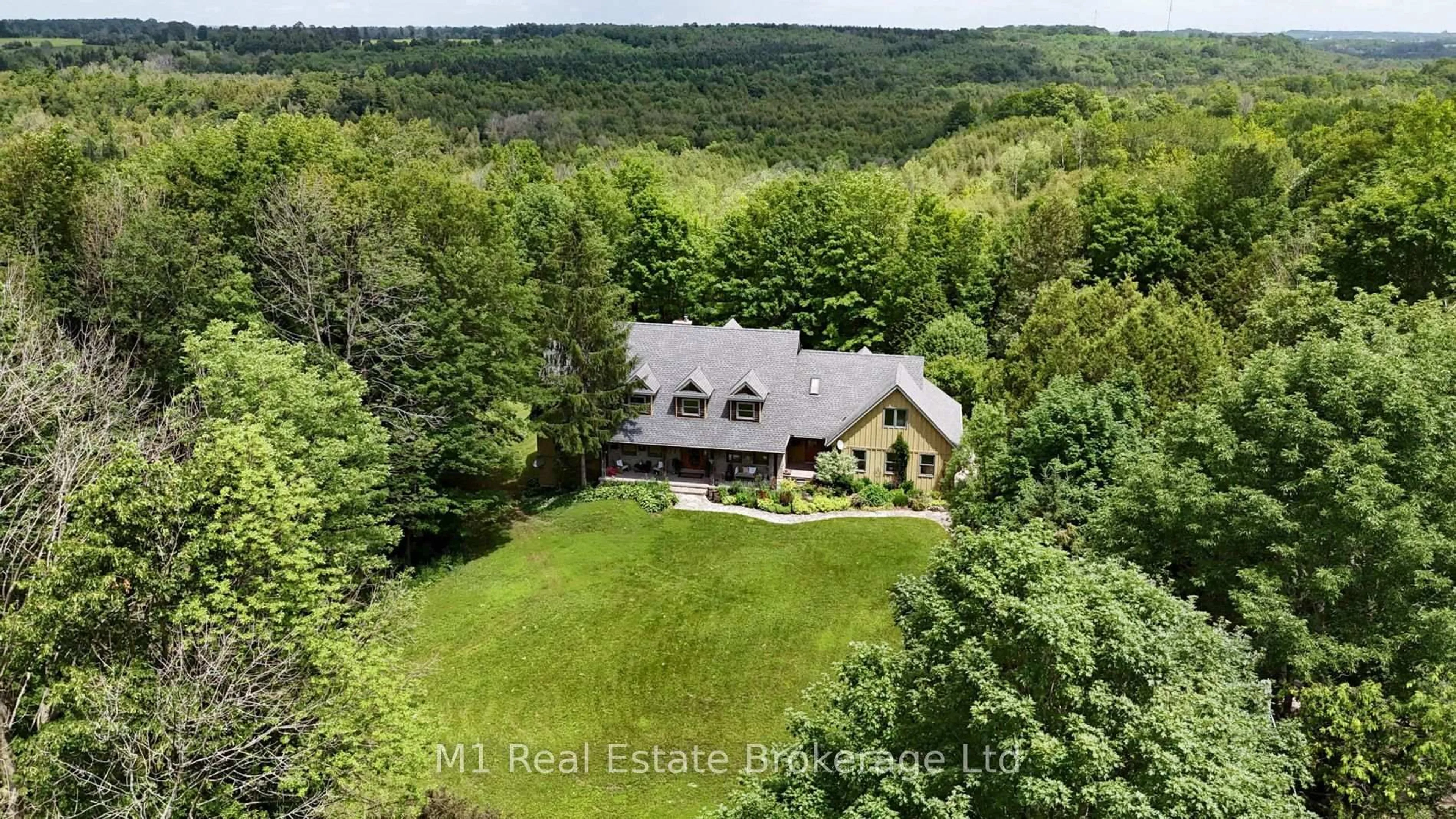 A pic from outside/outdoor area/front of a property/back of a property/a pic from drone, water/lake/river/ocean view for 142631 35 Rd, West Grey Ontario N0G 1C0
