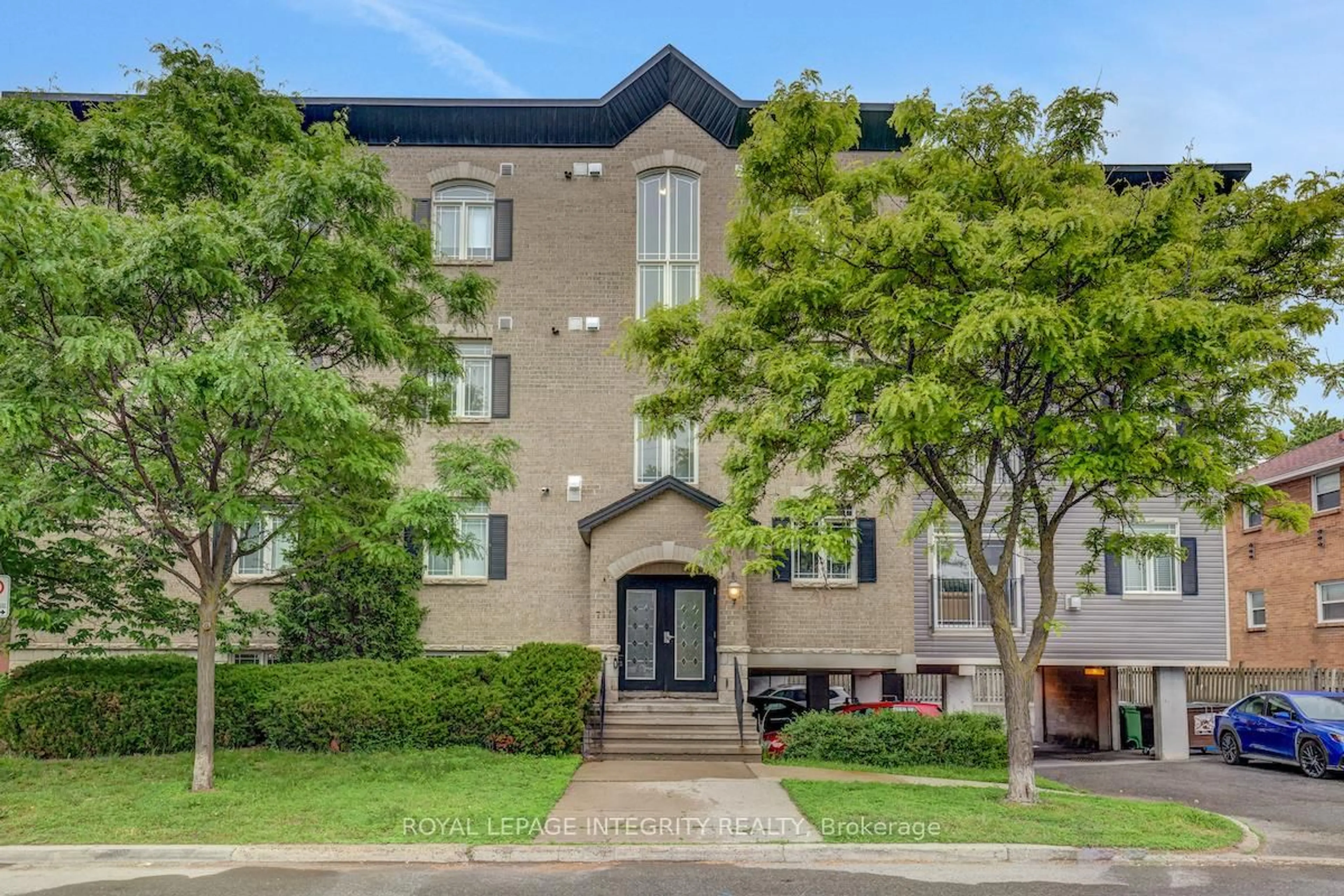Home with brick exterior material, street for 711 Churchill Ave #402, Ottawa Ontario K1Z 5G6