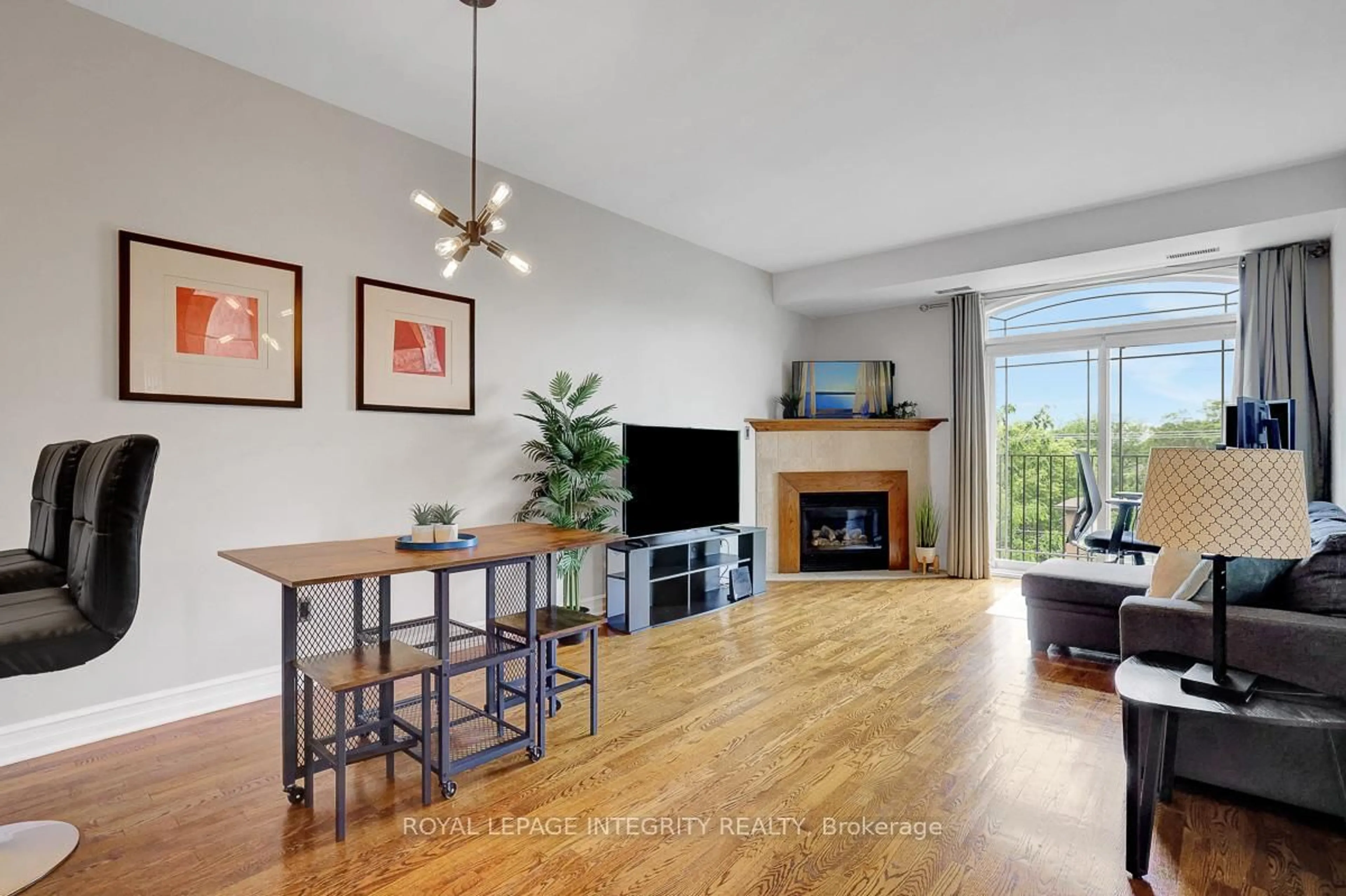 Living room with furniture, wood/laminate floor for 711 Churchill Ave #402, Ottawa Ontario K1Z 5G6