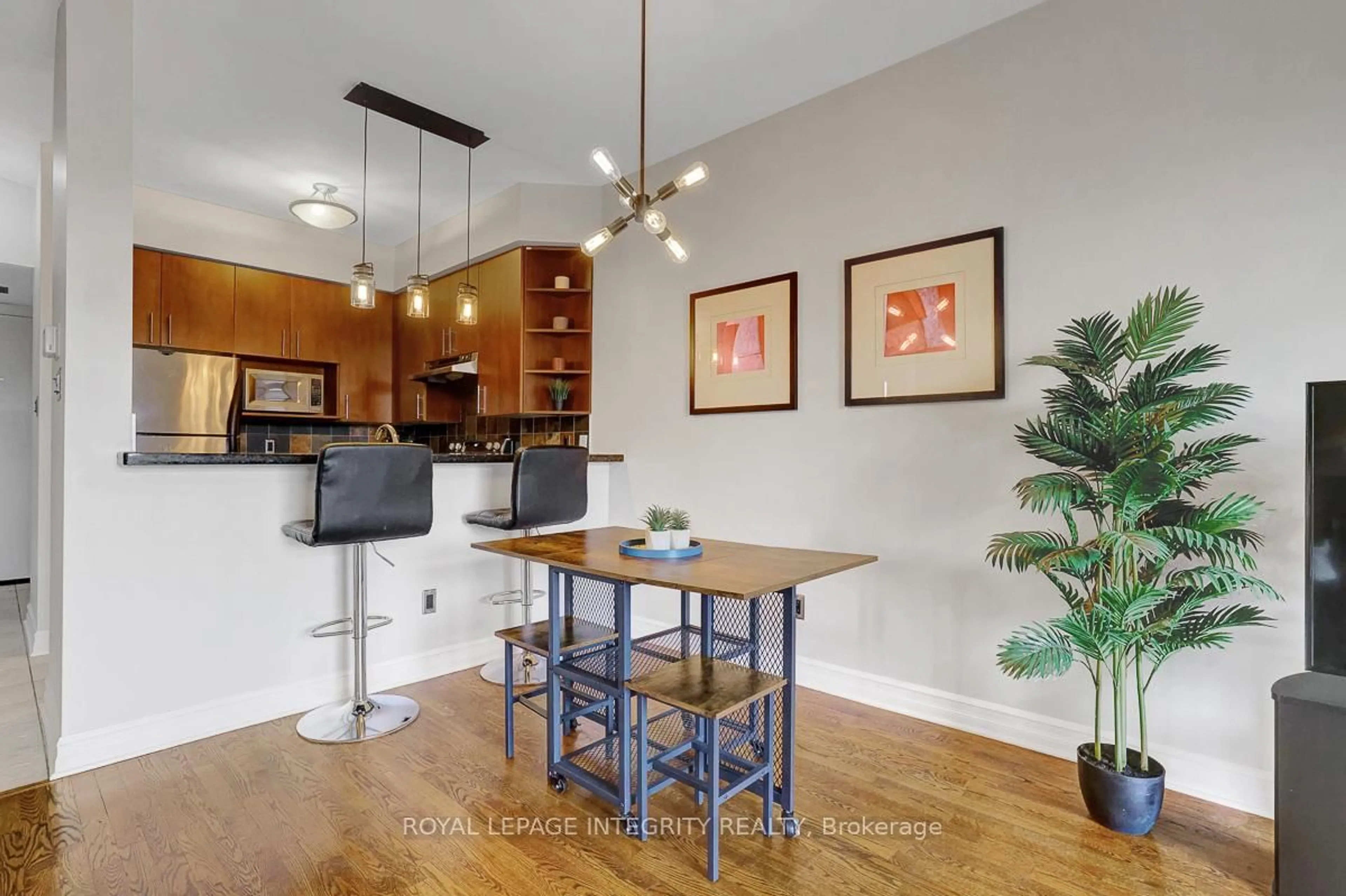 Open concept kitchen, wood/laminate floor for 711 Churchill Ave #402, Ottawa Ontario K1Z 5G6