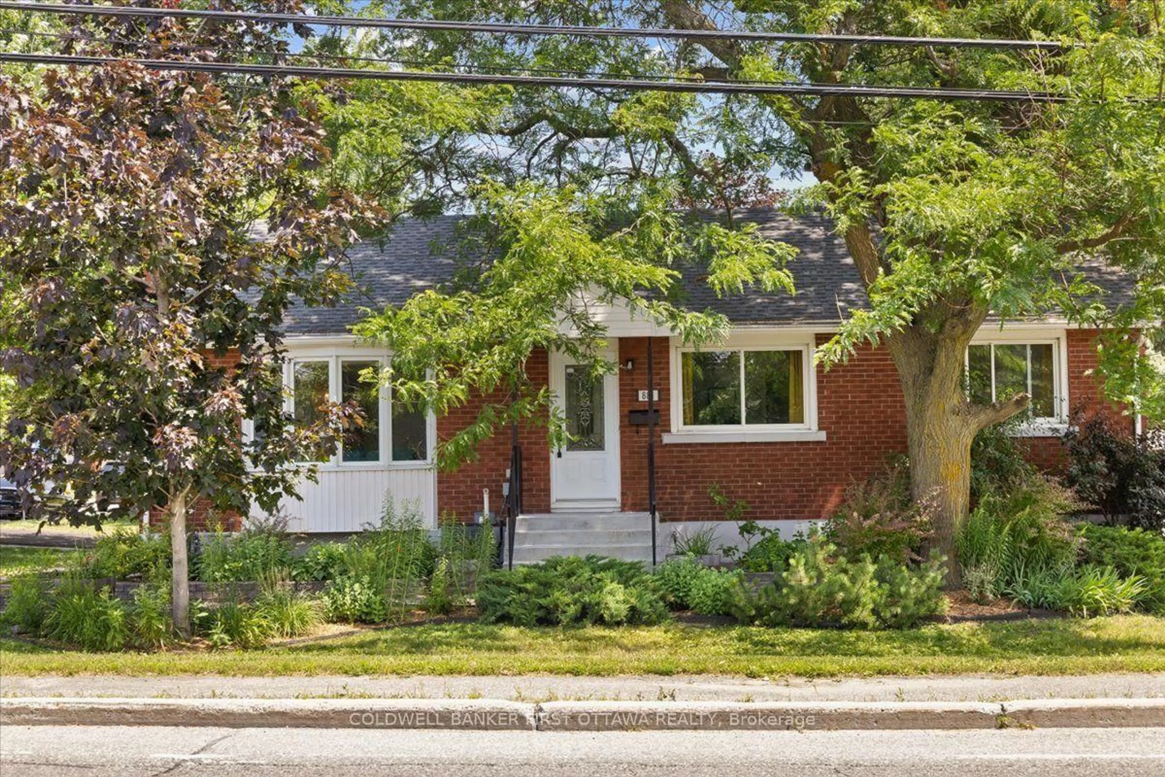 Home with brick exterior material, street for 881 BLAIR Rd, Ottawa Ontario K1J 7M7