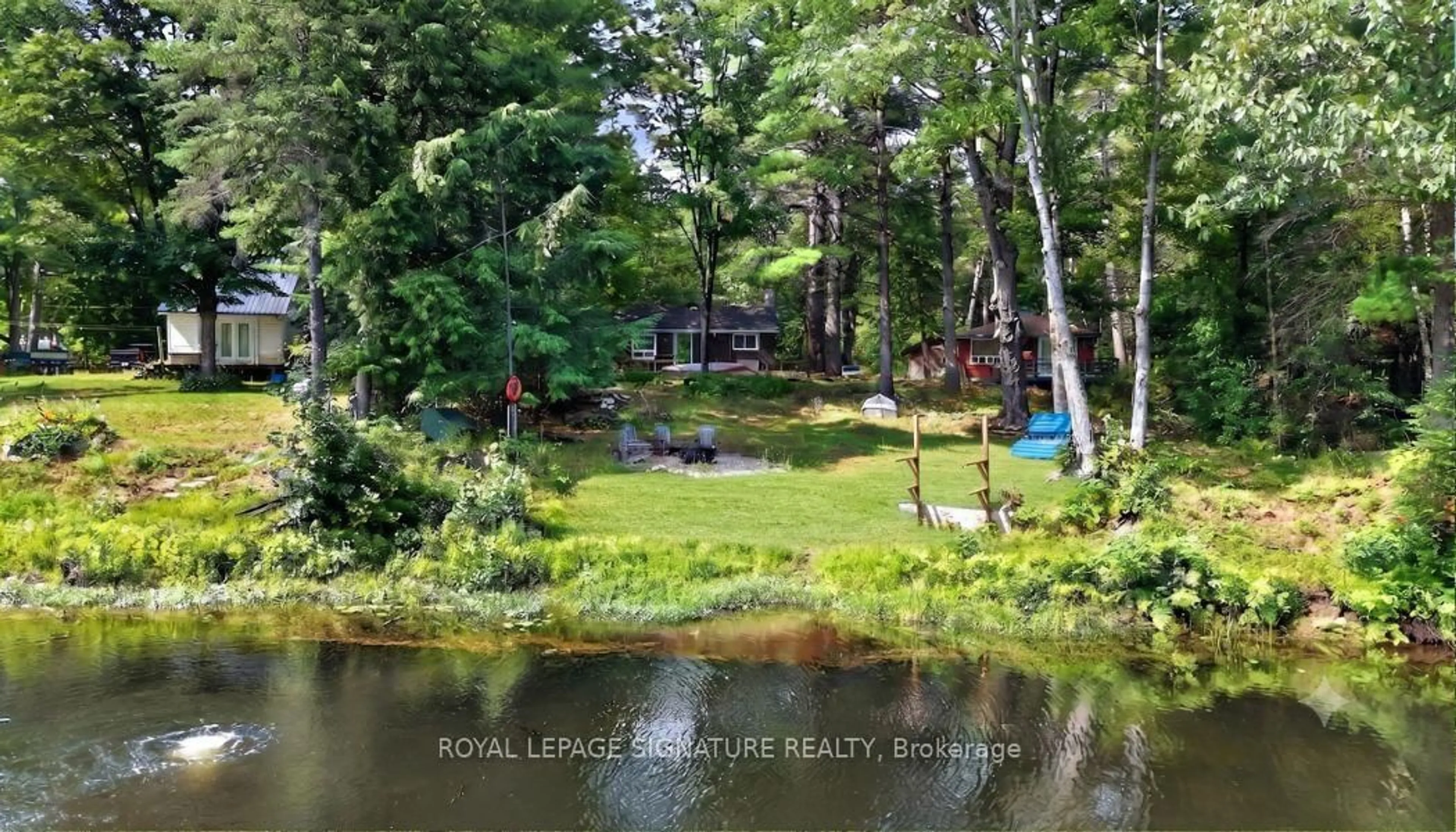 A pic from outside/outdoor area/front of a property/back of a property/a pic from drone, water/lake/river/ocean view for 26 Baker Lane, Kawartha Lakes Ontario L0K 1W0