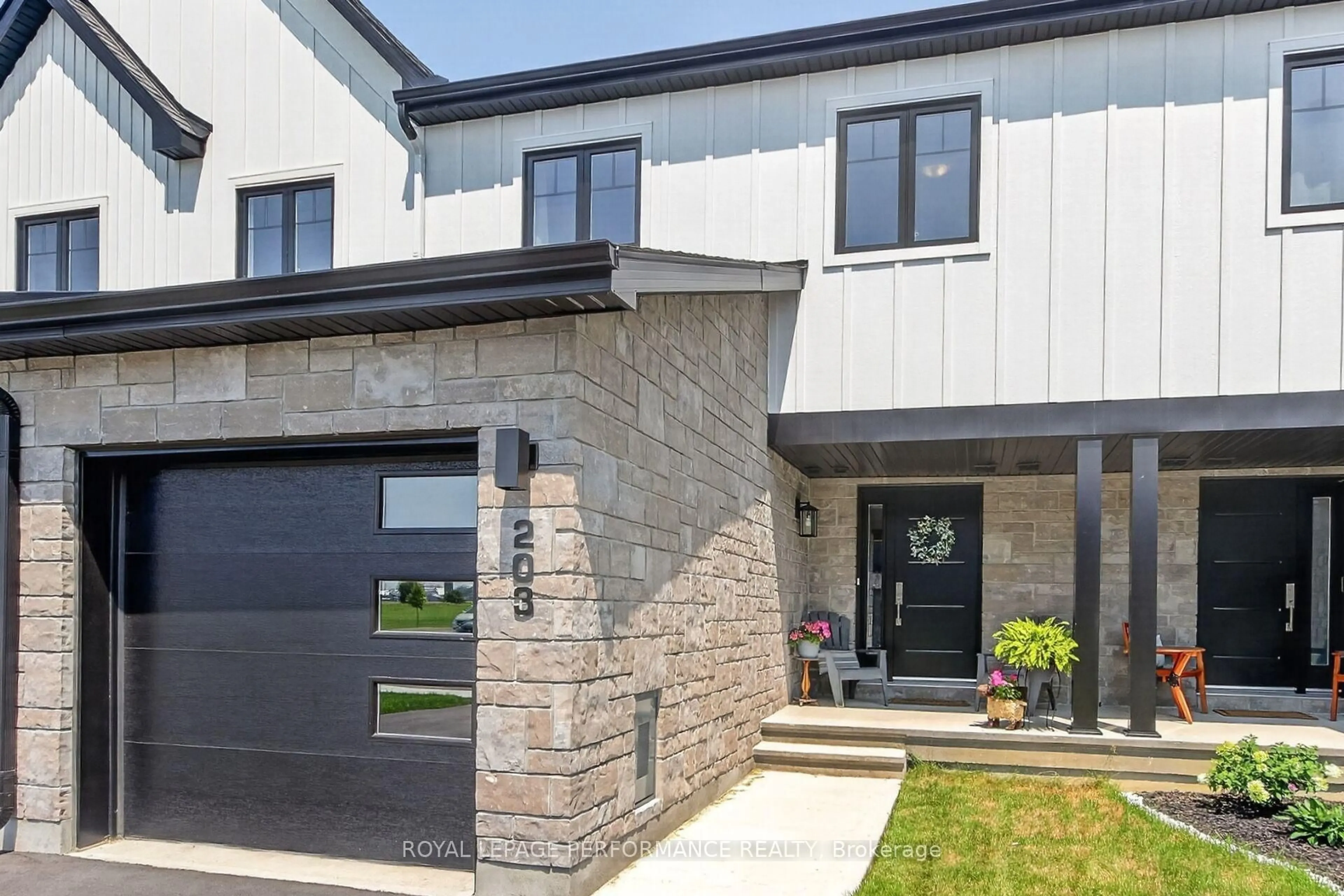 Home with brick exterior material, street for 203 Peacock Dr, Russell Ontario K4R 0M5