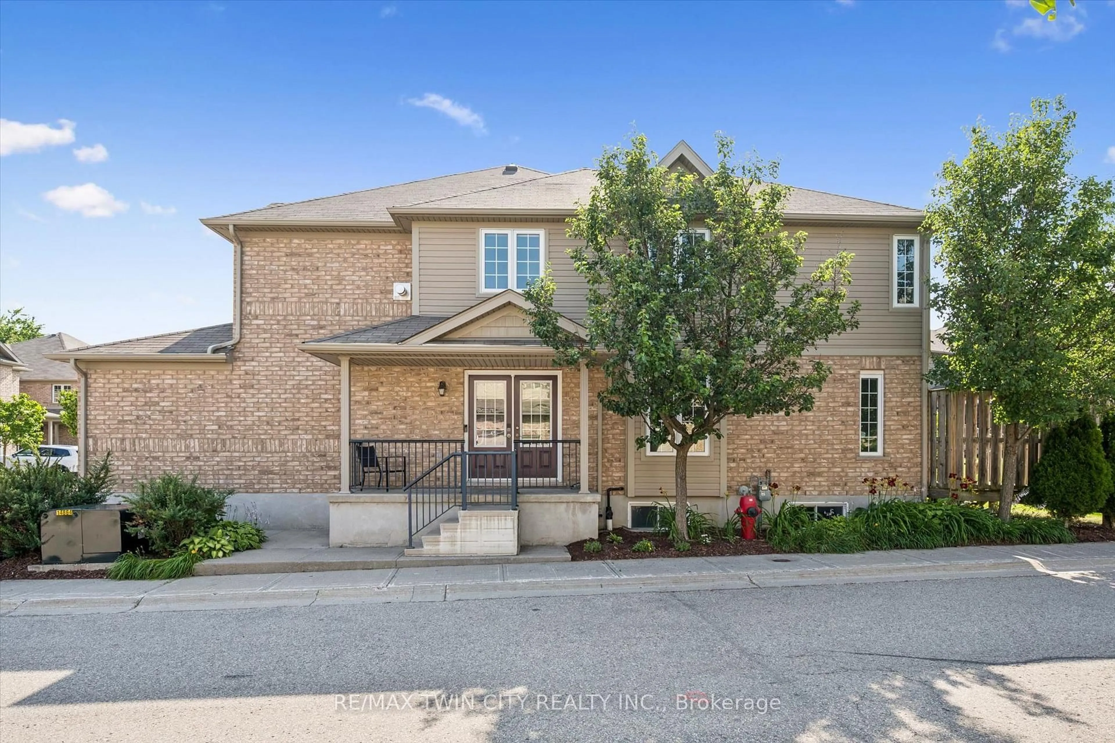 Home with brick exterior material, street for 555 Chablis Dr #36, Waterloo Ontario N2T 0A5