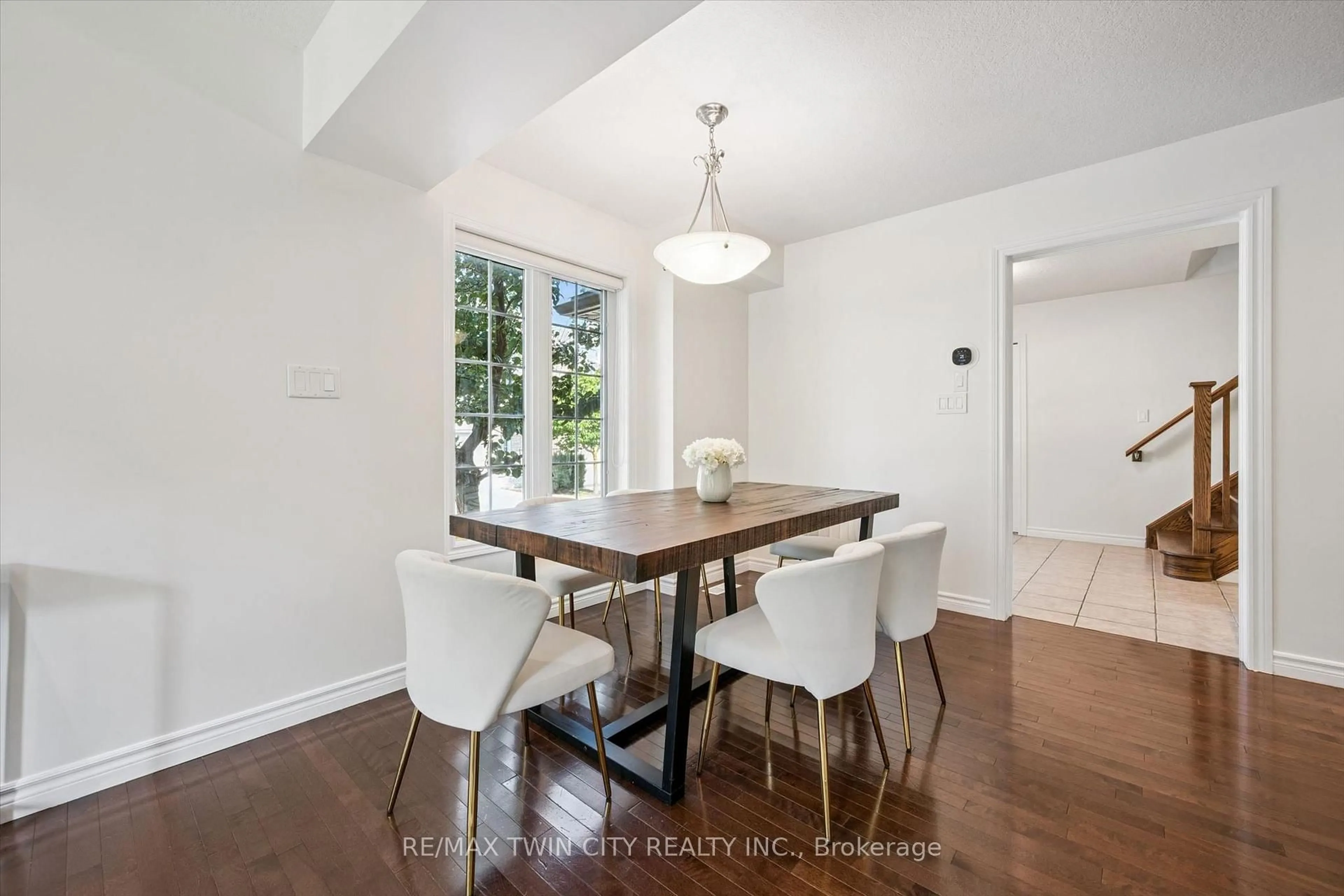 Dining room, wood/laminate floor for 555 Chablis Dr #36, Waterloo Ontario N2T 0A5