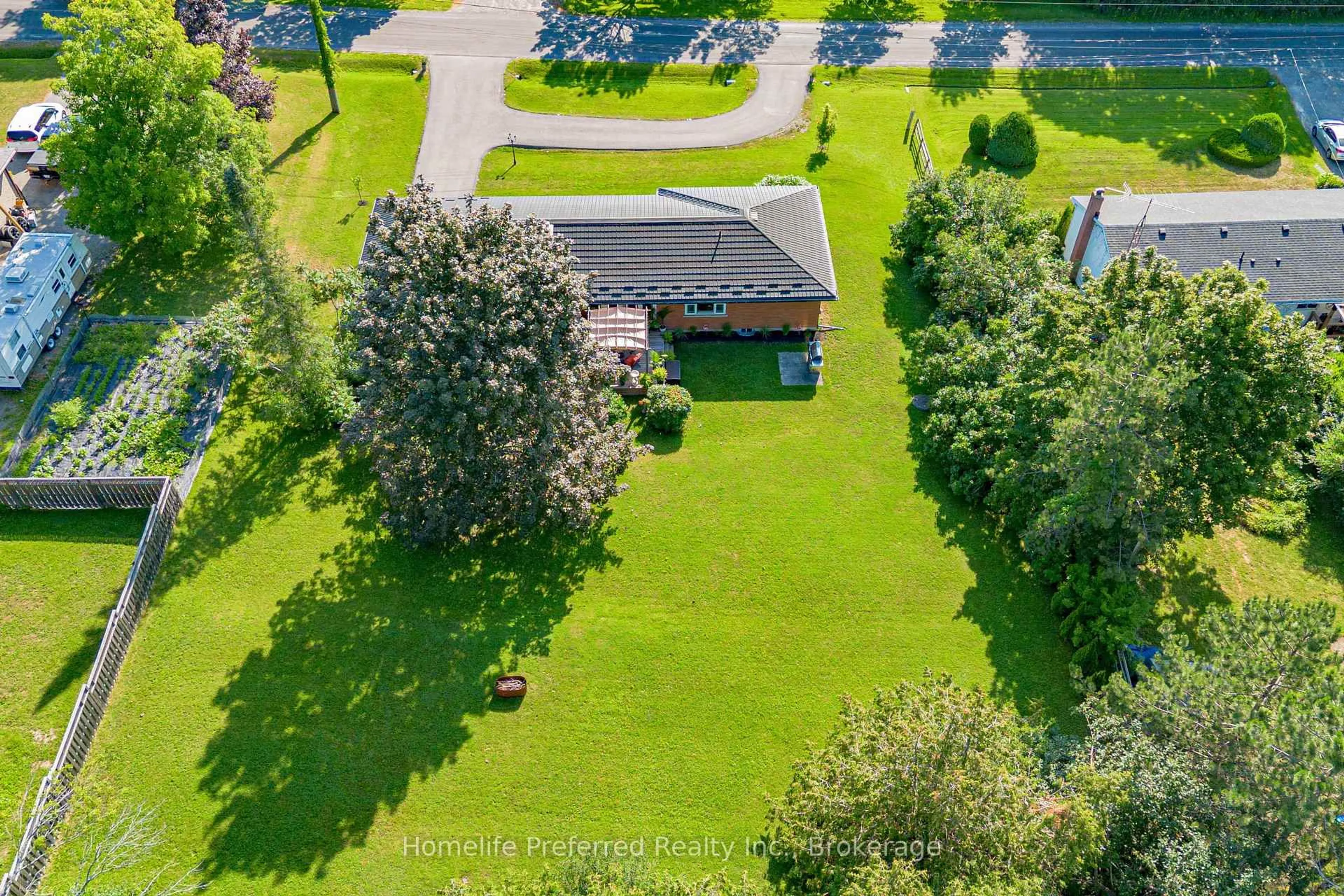 A pic from outside/outdoor area/front of a property/back of a property/a pic from drone, water/lake/river/ocean view for 548 Bissview Ave, Selwyn Ontario K9J 6X4
