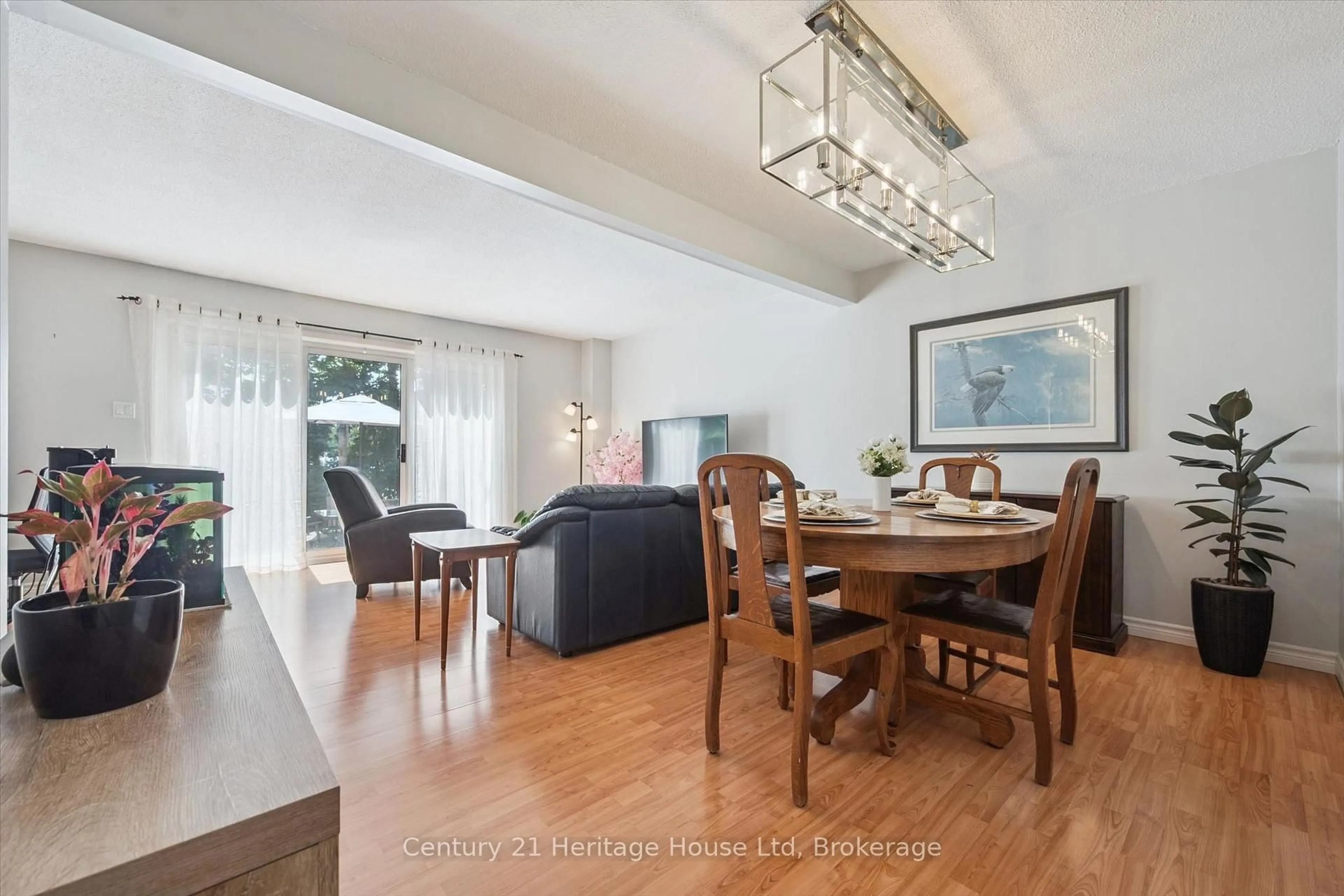 Dining room, wood/laminate floor for 201 Silvercreek Pkwy #15, Guelph Ontario N1H 3T4