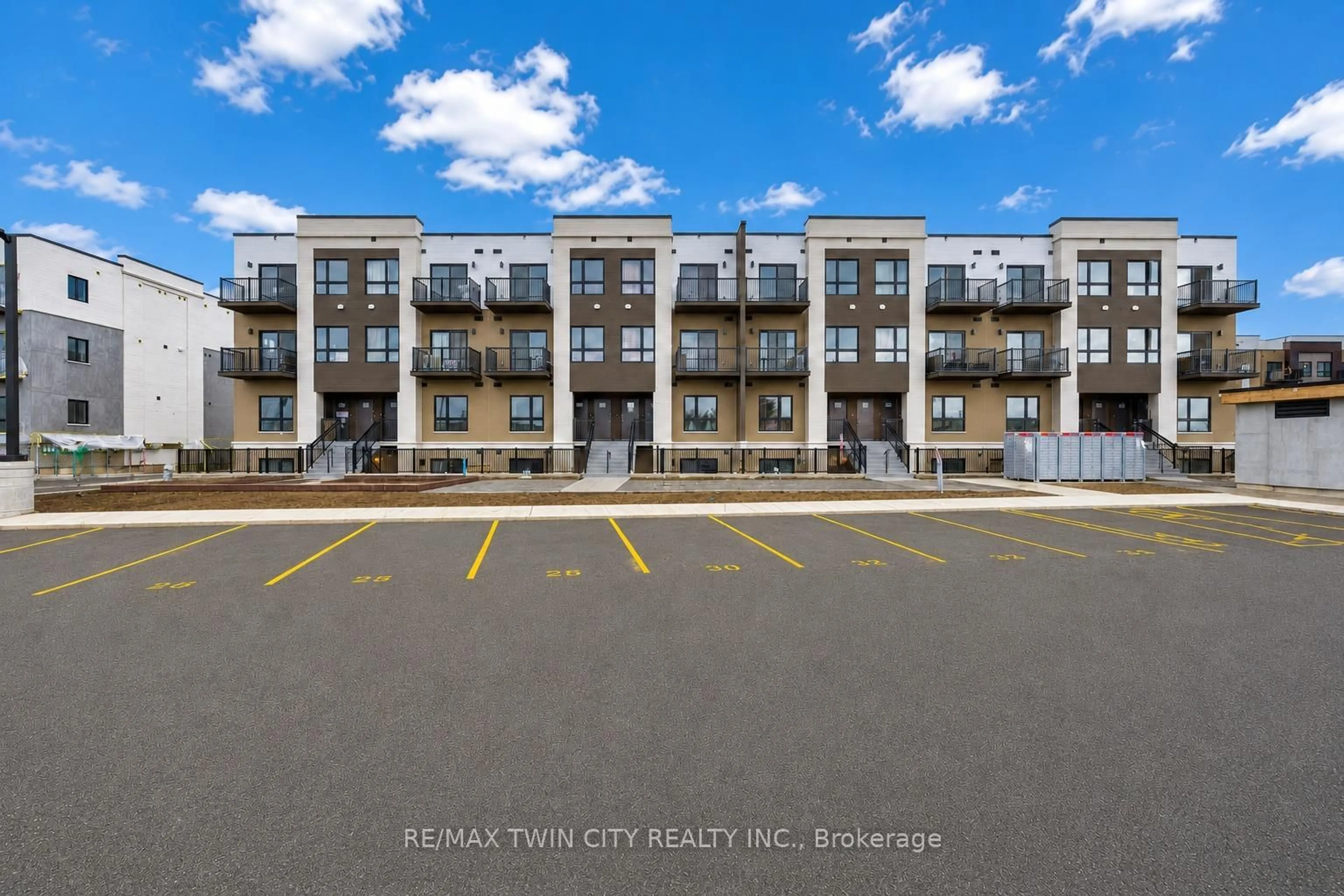 A pic from outside/outdoor area/front of a property/back of a property/a pic from drone, city buildings view from balcony for 25 Palace St #Q24, Kitchener Ontario N2E 3M6