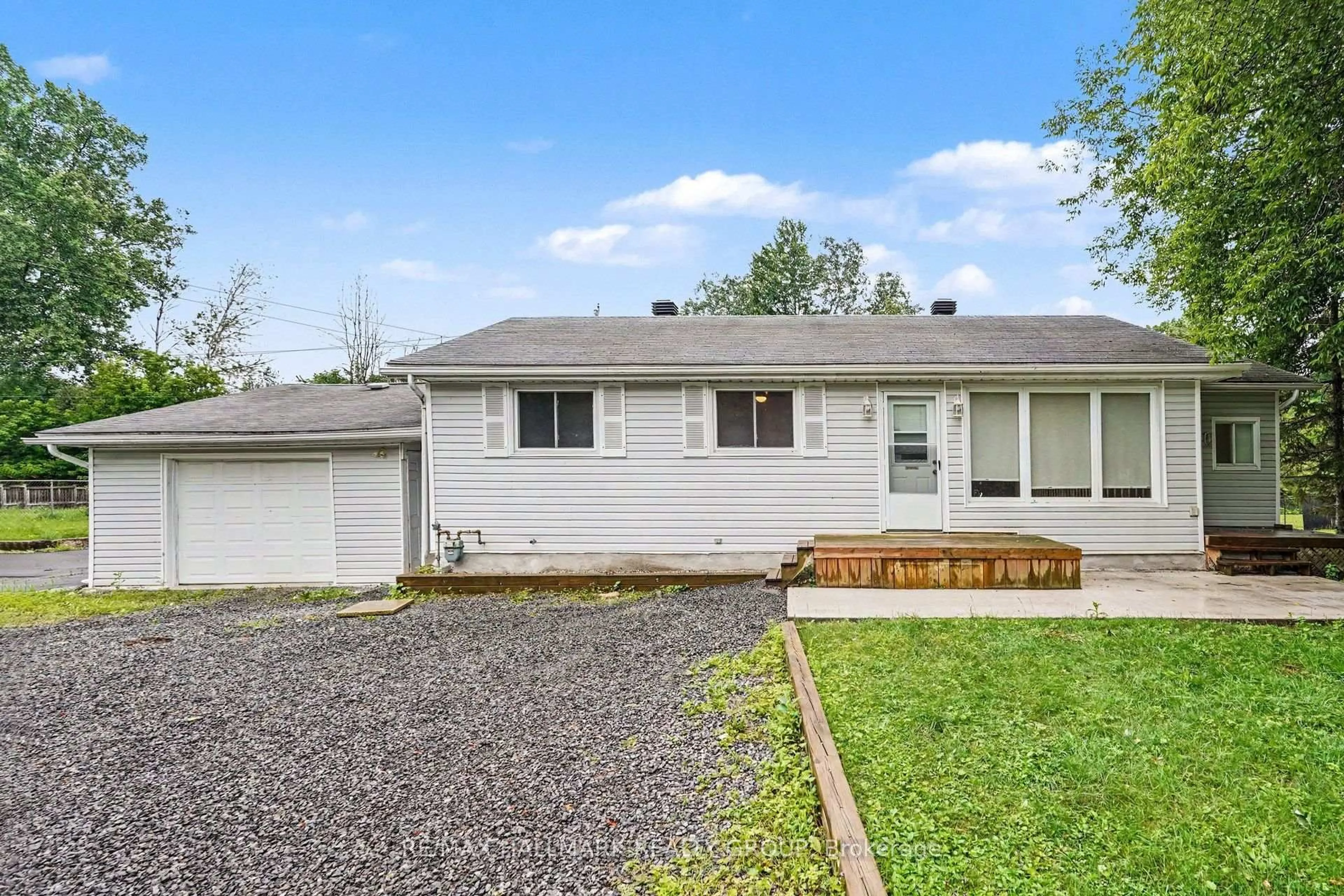 Home with vinyl exterior material, street for 7220 Mitch Owens Rd, Ottawa Ontario K4P 1K8