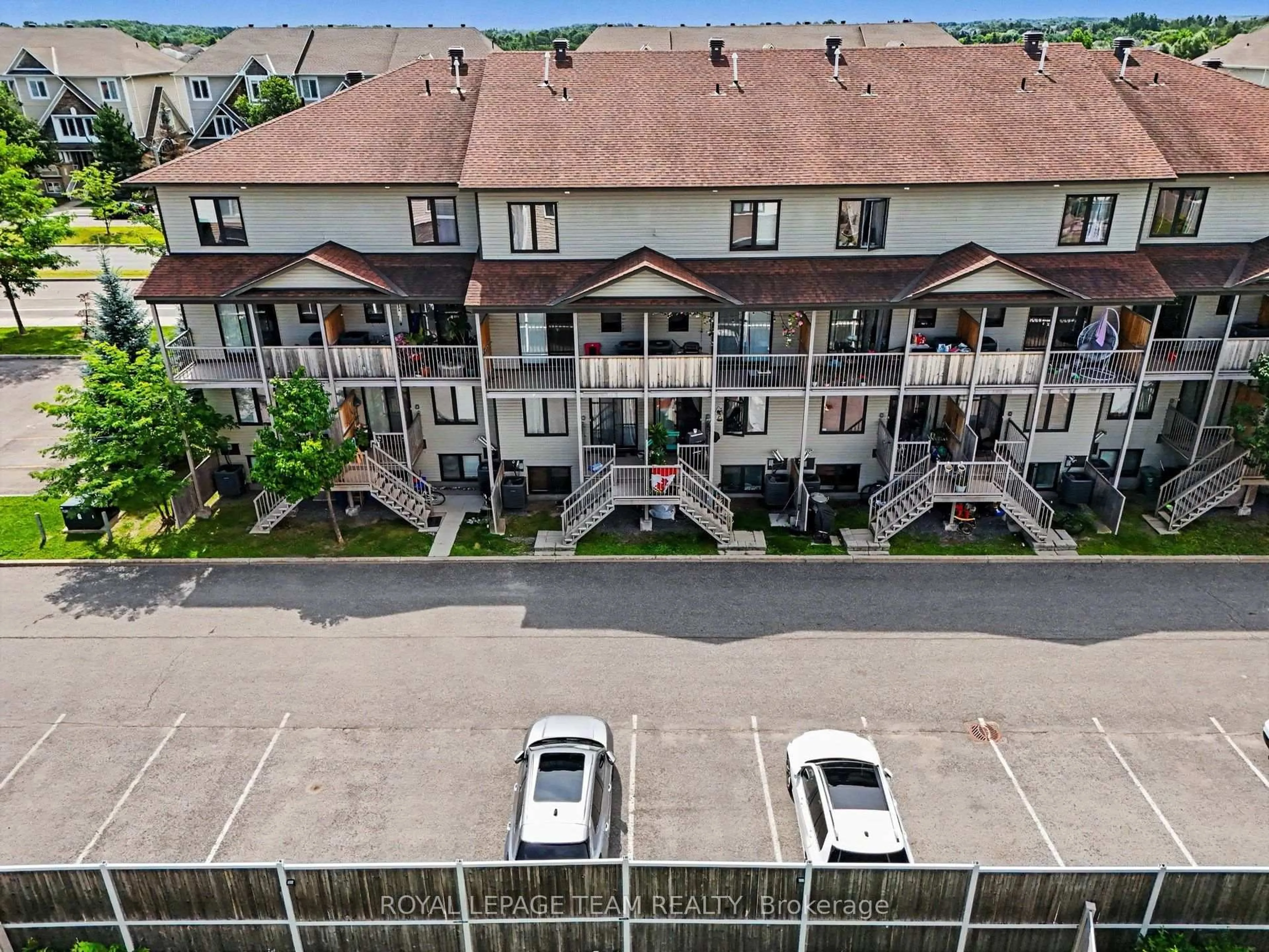 A pic from outside/outdoor area/front of a property/back of a property/a pic from drone, city buildings view from balcony for 621 Chapman Mills Dr #C, Ottawa Ontario K2J 5T1