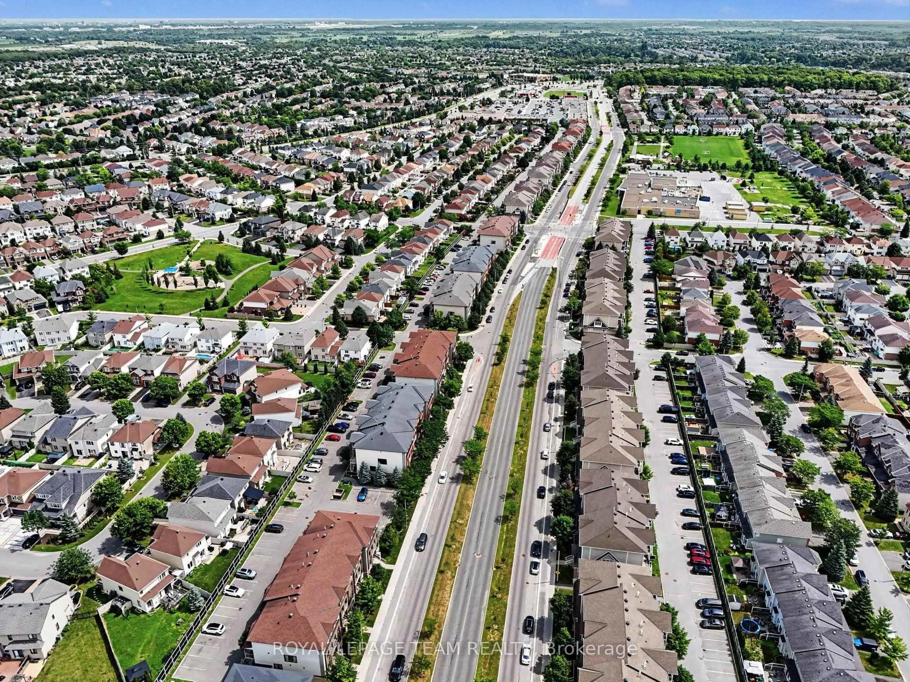 A pic from outside/outdoor area/front of a property/back of a property/a pic from drone, street for 621 Chapman Mills Dr #C, Ottawa Ontario K2J 5T1