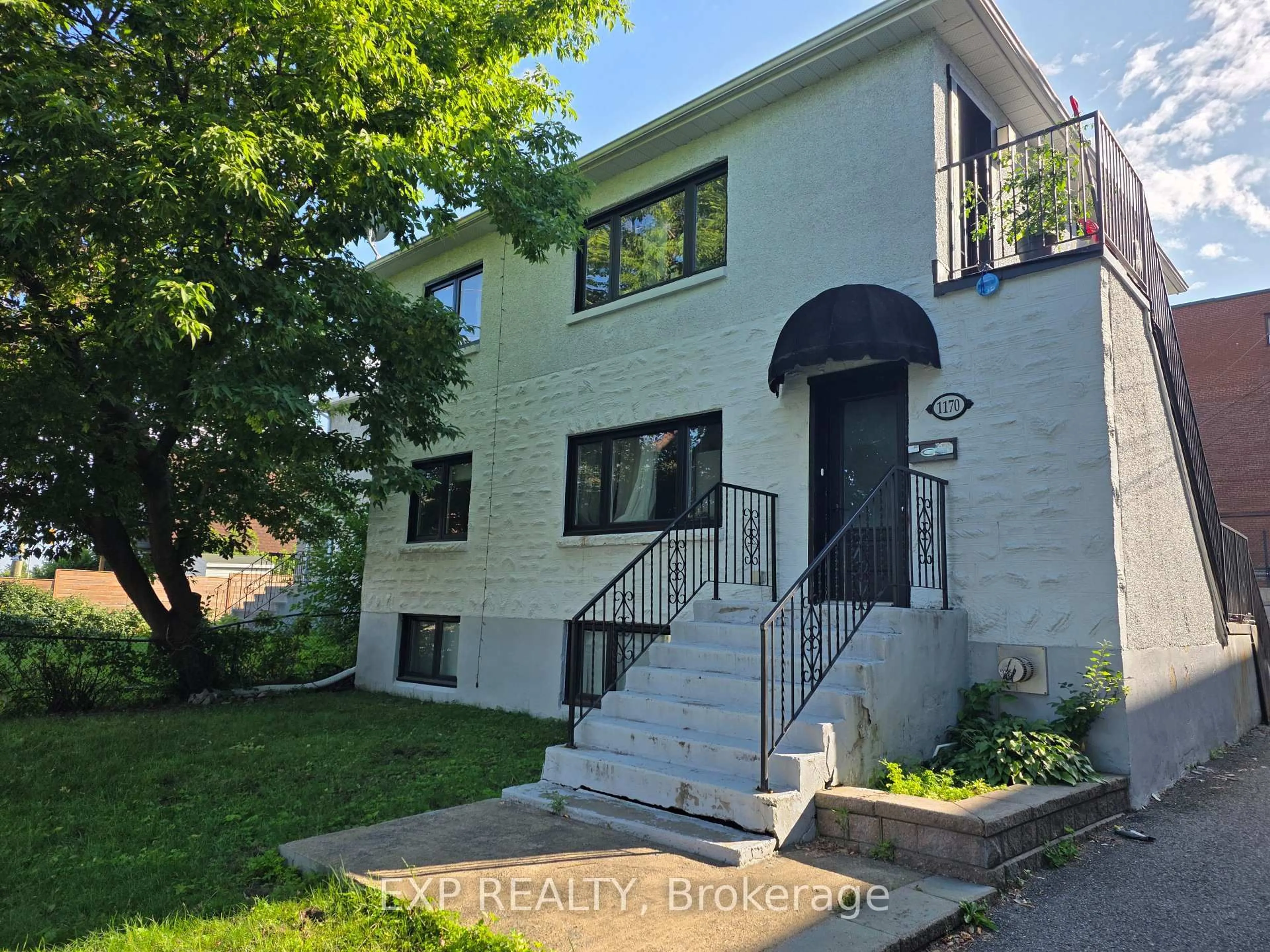 Home with brick exterior material, street for 1170 Merivale Rd, Ottawa Ontario K1Z 6B7
