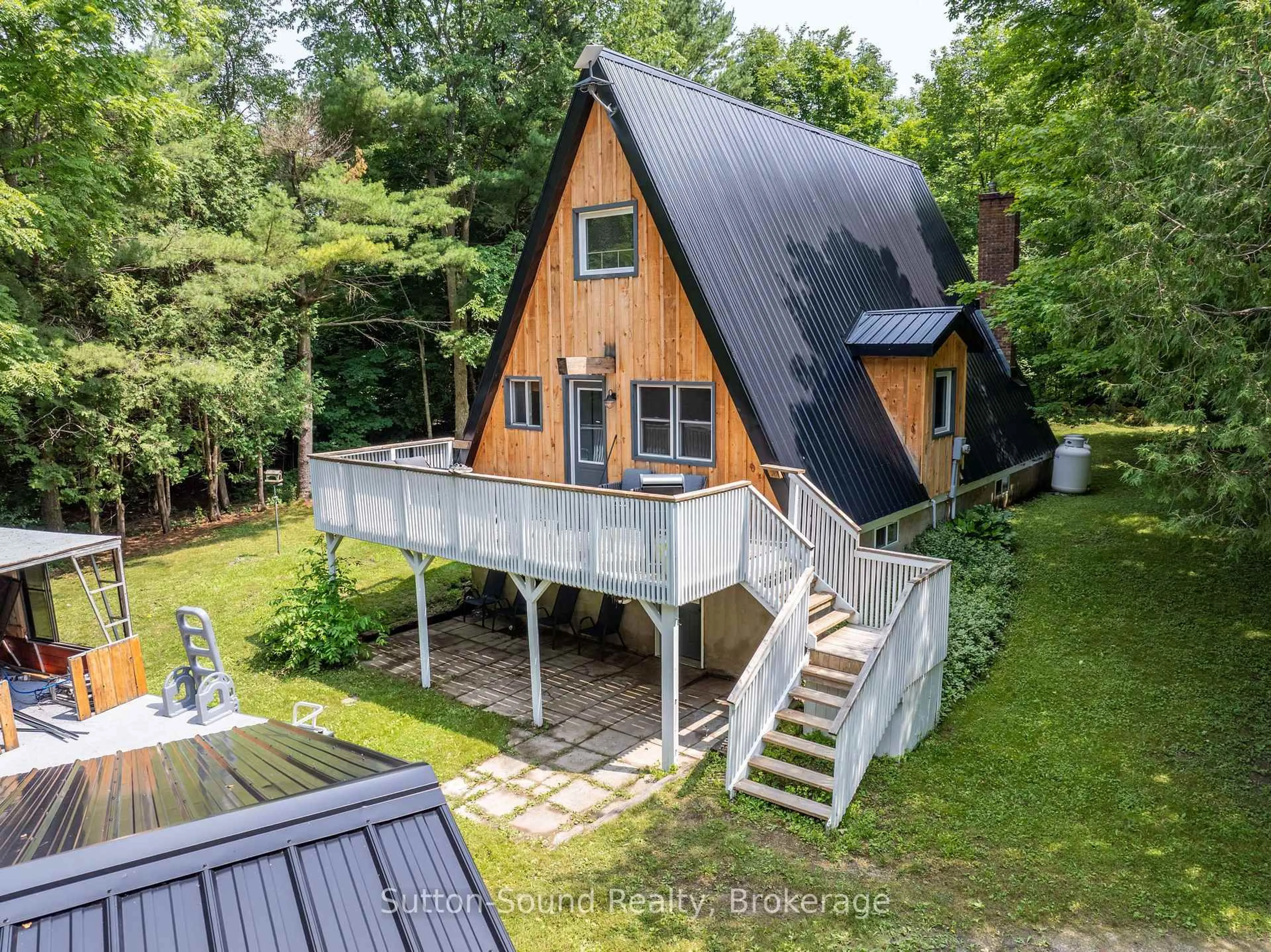 A pic from outside/outdoor area/front of a property/back of a property/a pic from drone, unknown for 113 Big Rock Rd, Georgian Bluffs Ontario N0H 2K0