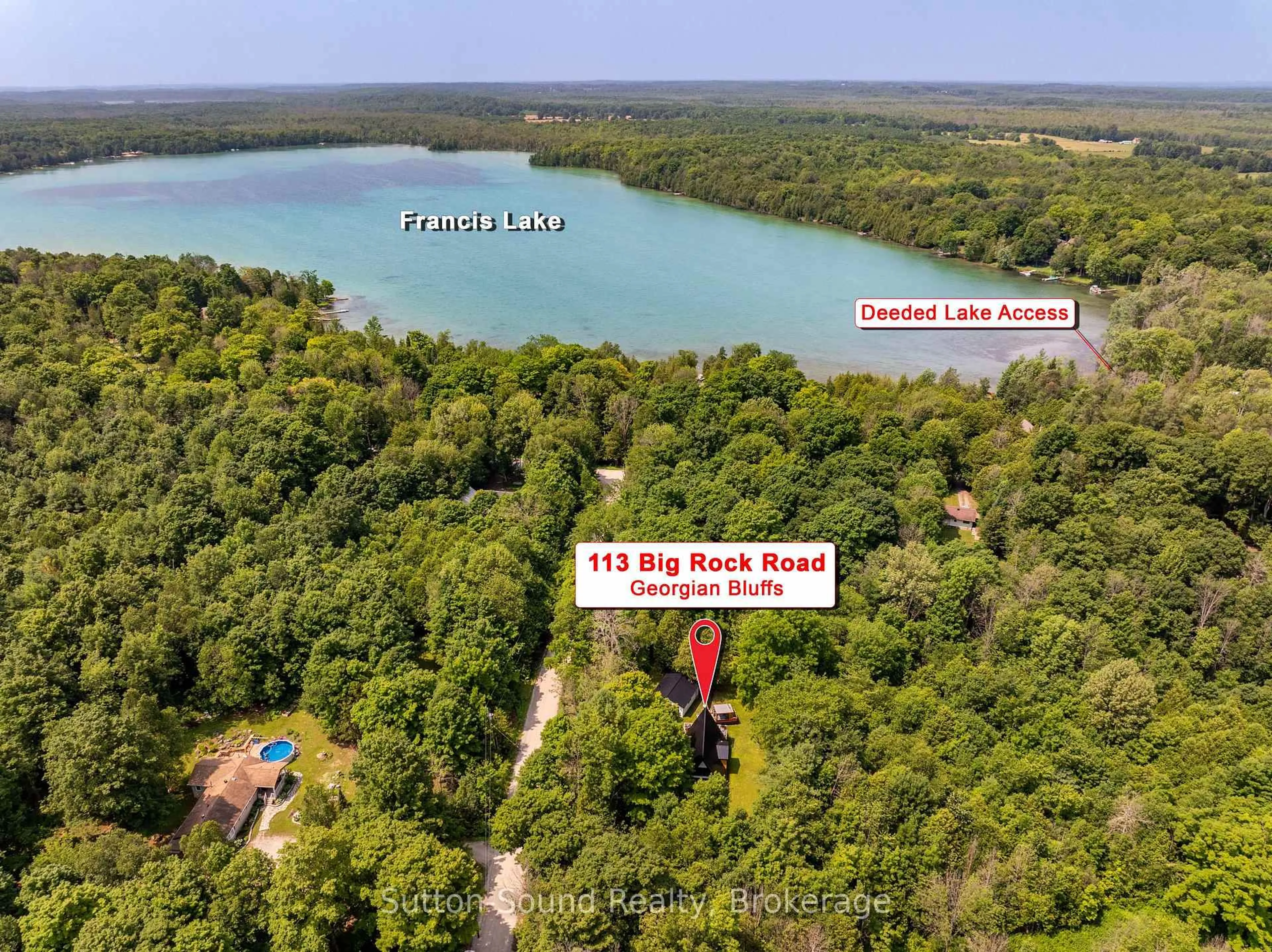 A pic from outside/outdoor area/front of a property/back of a property/a pic from drone, water/lake/river/ocean view for 113 Big Rock Rd, Georgian Bluffs Ontario N0H 2K0