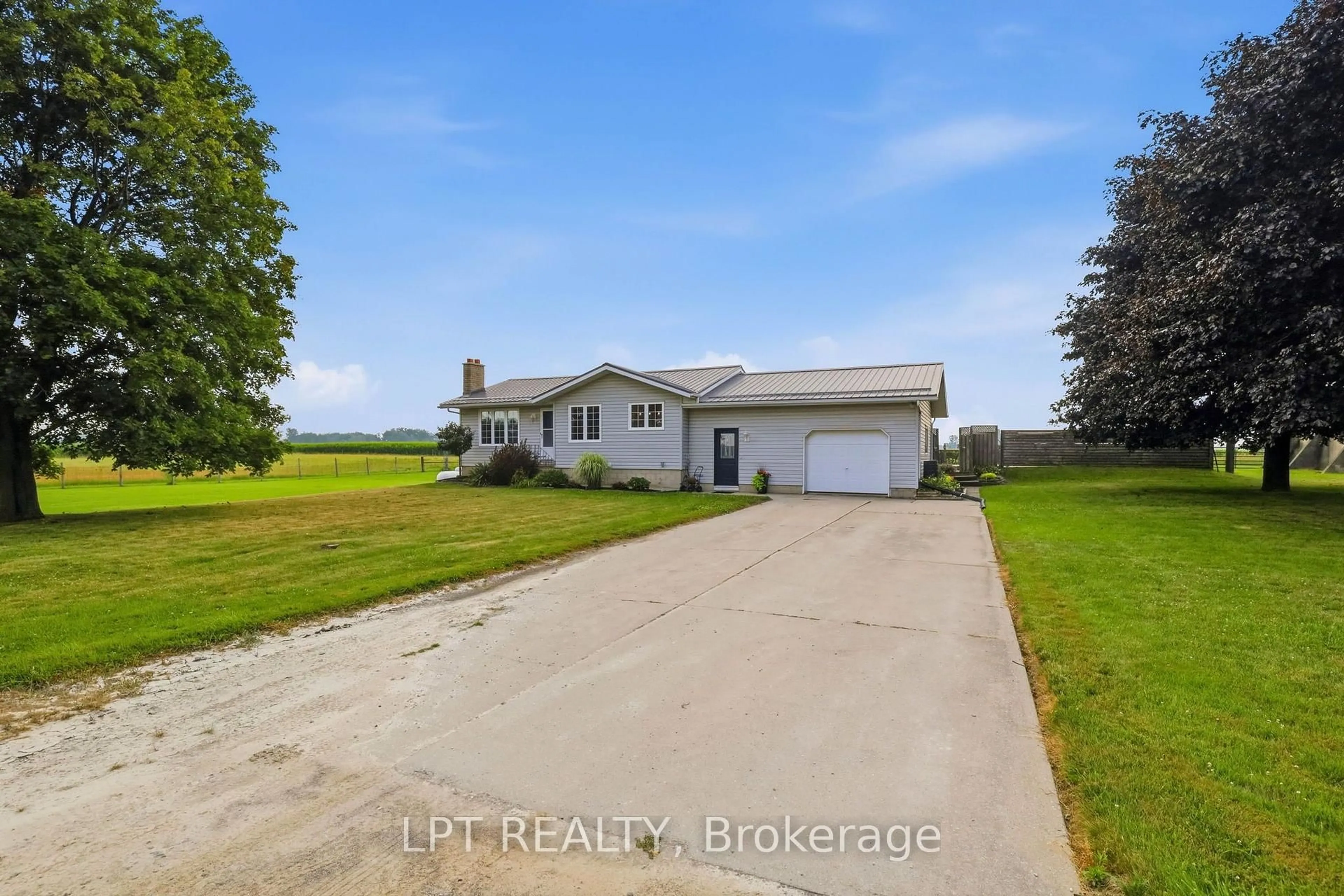 A pic from outside/outdoor area/front of a property/back of a property/a pic from drone, water/lake/river/ocean view for 22095 Mc Dougall Line, West Elgin Ontario N0L 2C0