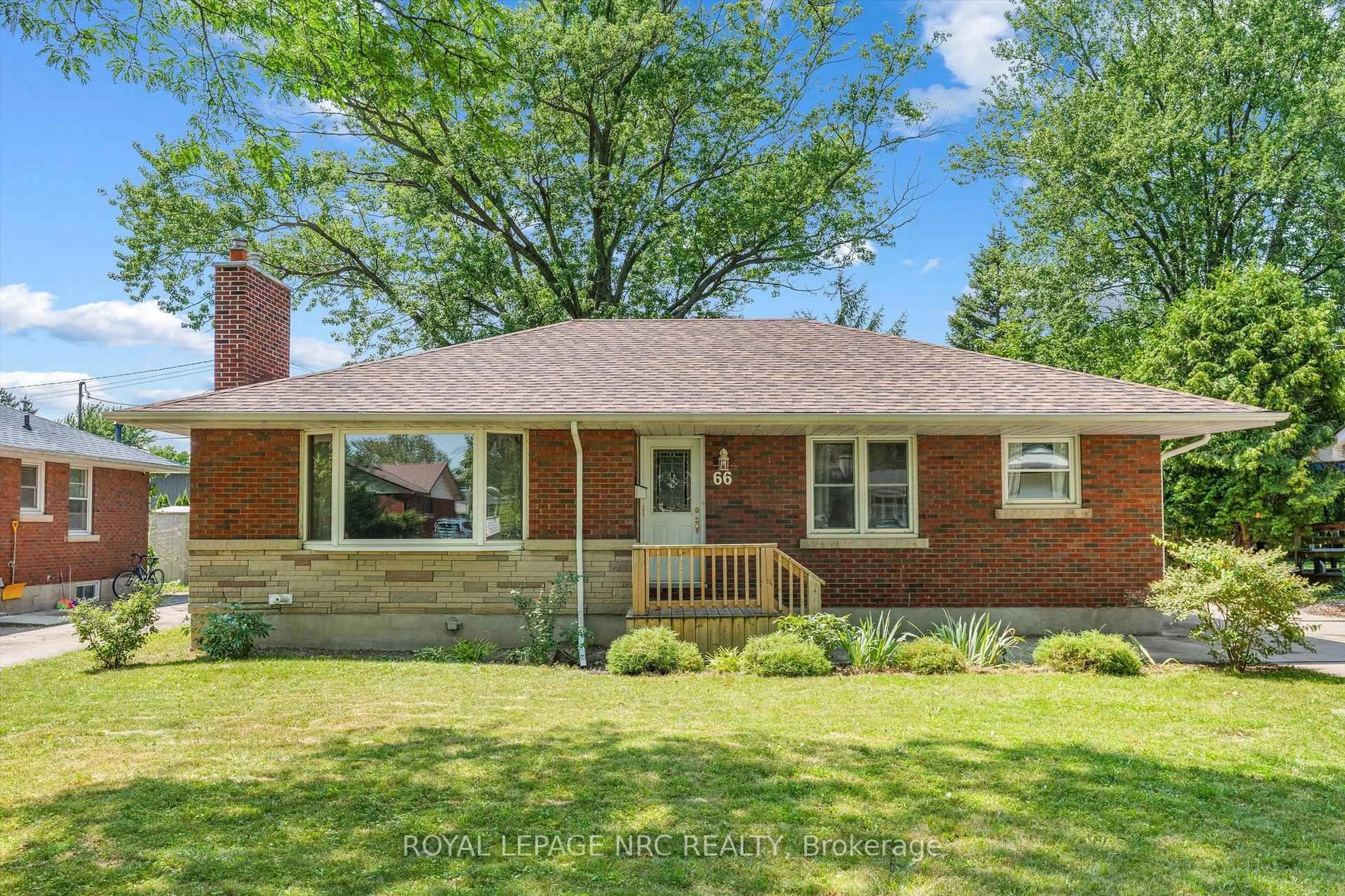 Home with brick exterior material, street for 66 Masterson Dr, St. Catharines Ontario L2T 3P7