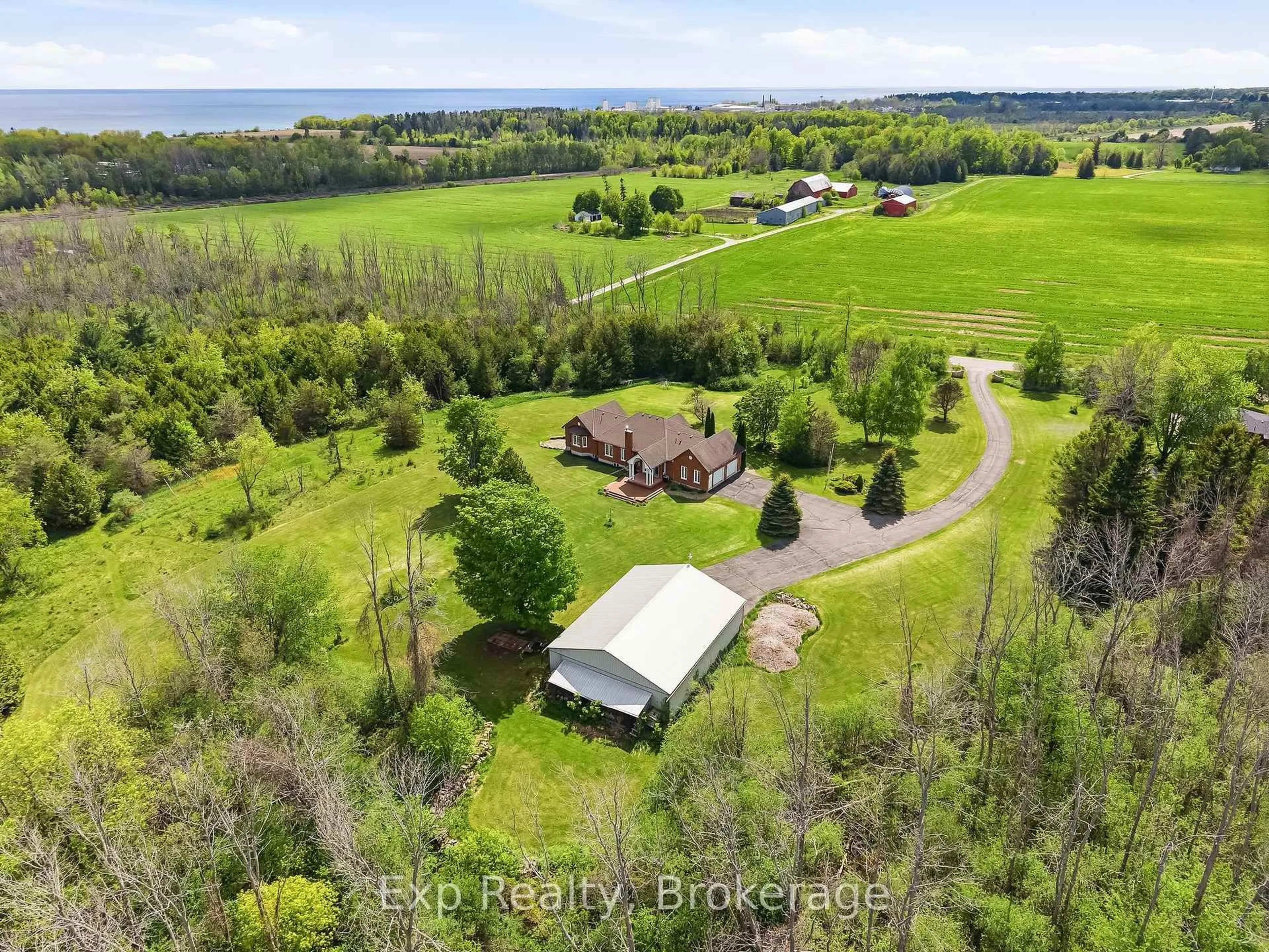 A pic from outside/outdoor area/front of a property/back of a property/a pic from drone, water/lake/river/ocean view for 1497 Pentecostal Rd, Hamilton Township Ontario K9A 4J8
