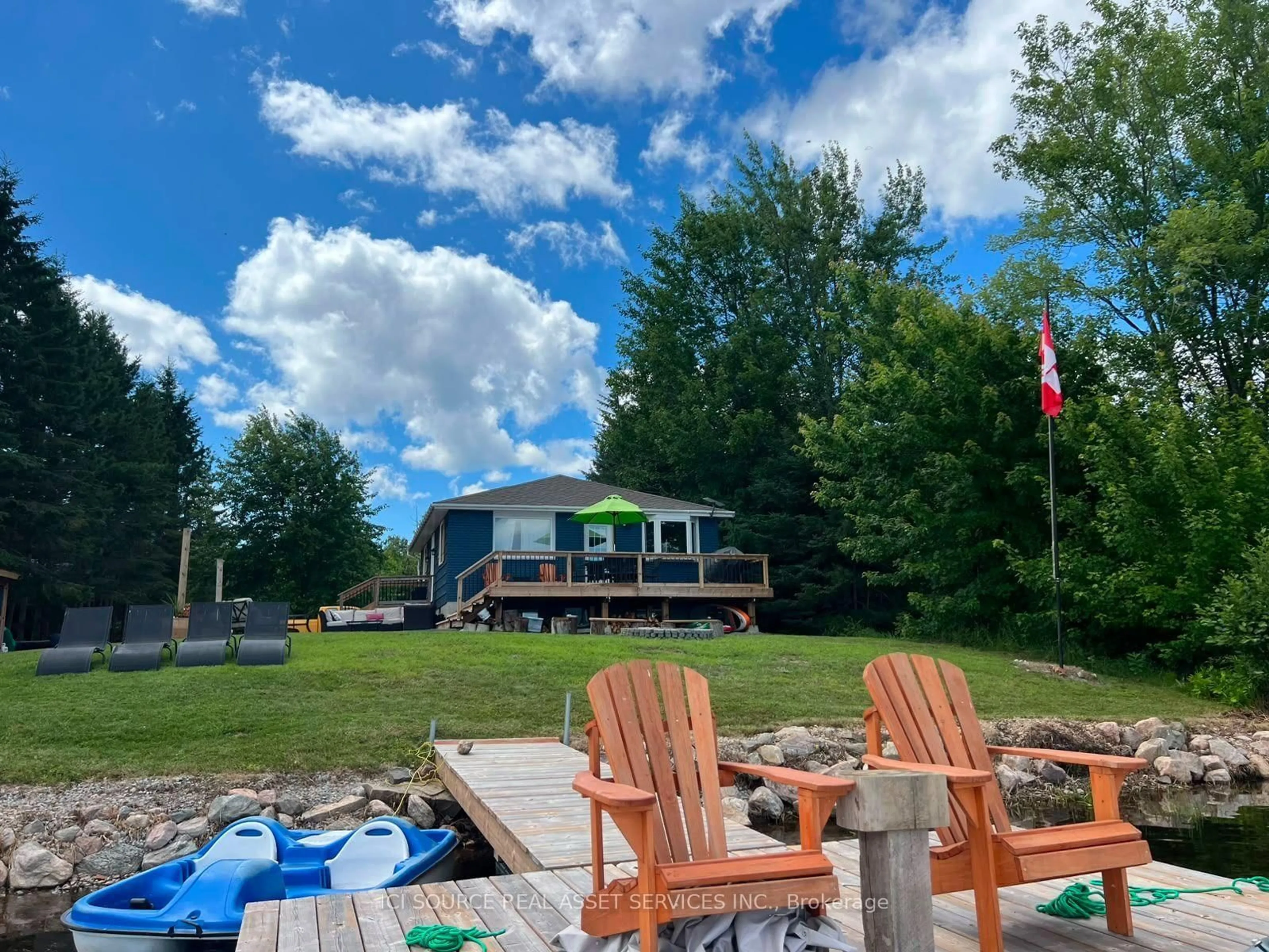 A pic from outside/outdoor area/front of a property/back of a property/a pic from drone, water/lake/river/ocean view for 47 Mundts Bay Lane, Golden Lake Ontario K0J 1X0