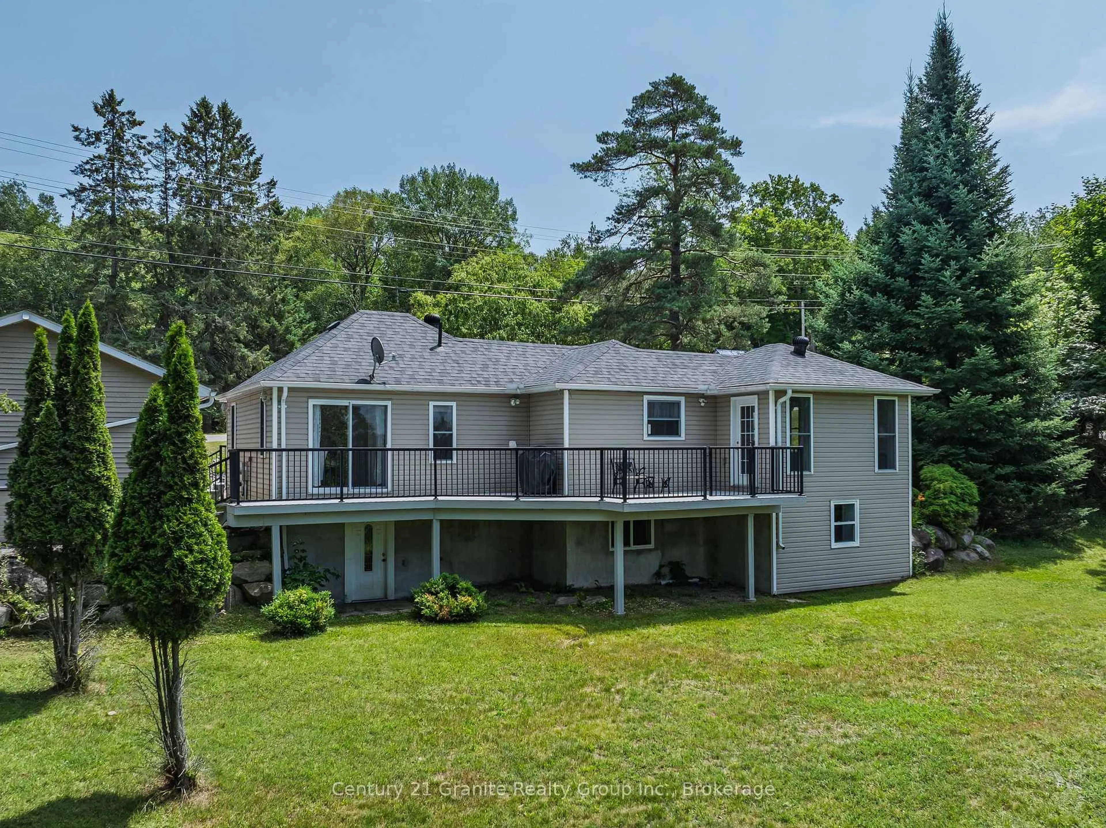 A pic from outside/outdoor area/front of a property/back of a property/a pic from drone, water/lake/river/ocean view for 7177 Gelert Rd, Dysart et al Ontario K0M 1S0