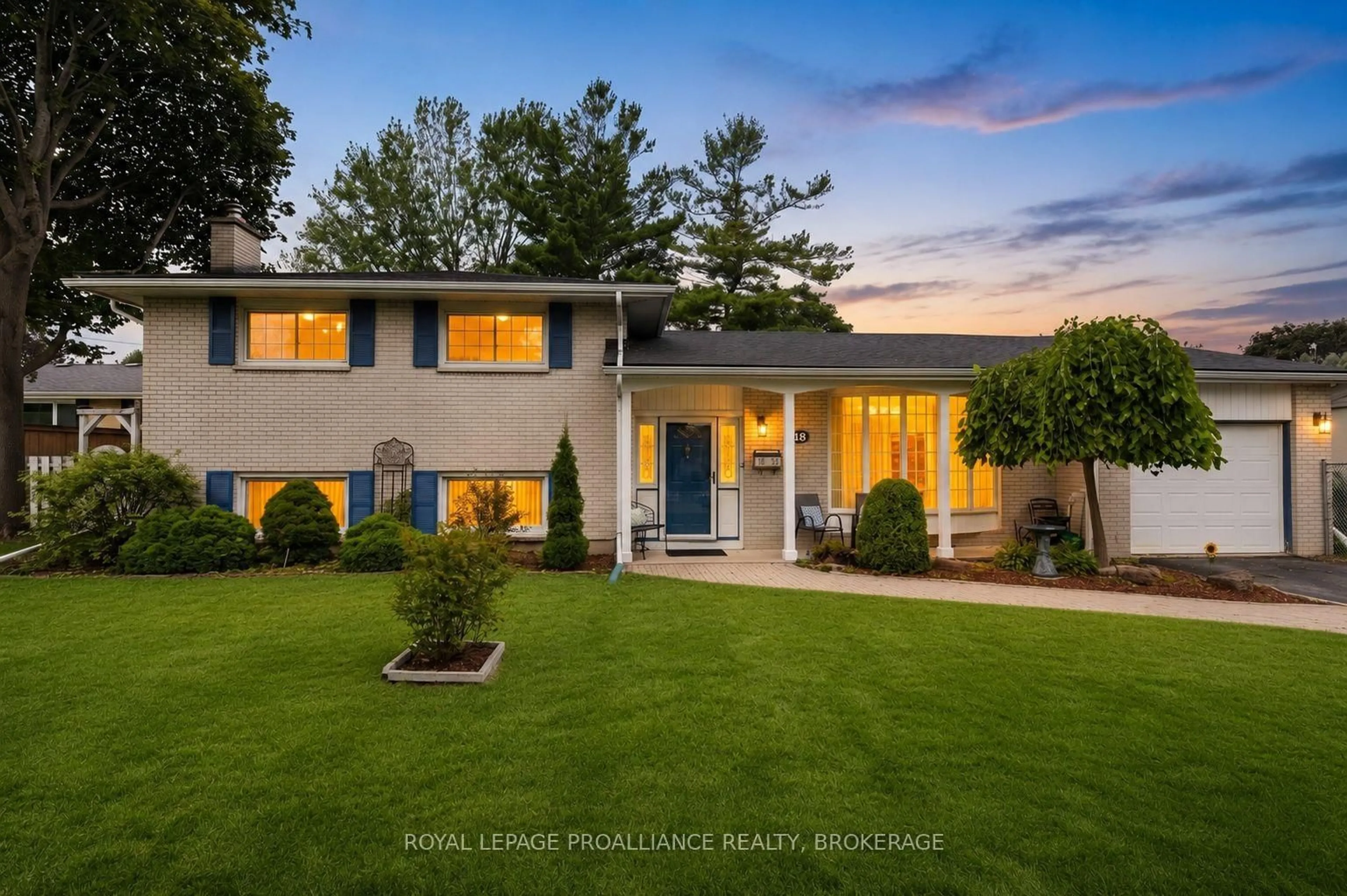 Home with vinyl exterior material, street for 18 Casterton Ave, Kingston Ontario K7M 1R5