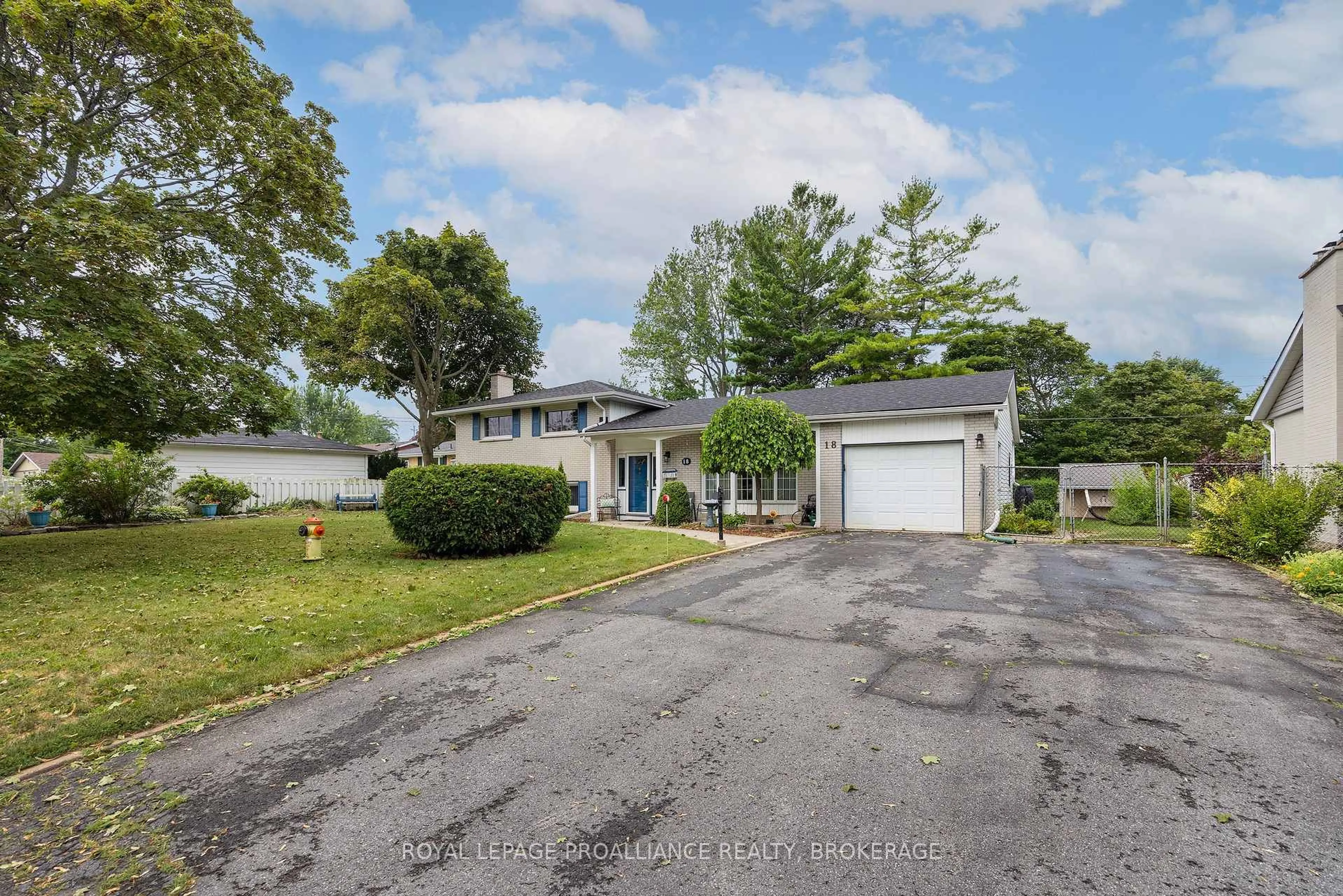 A pic from outside/outdoor area/front of a property/back of a property/a pic from drone, street for 18 Casterton Ave, Kingston Ontario K7M 1R5