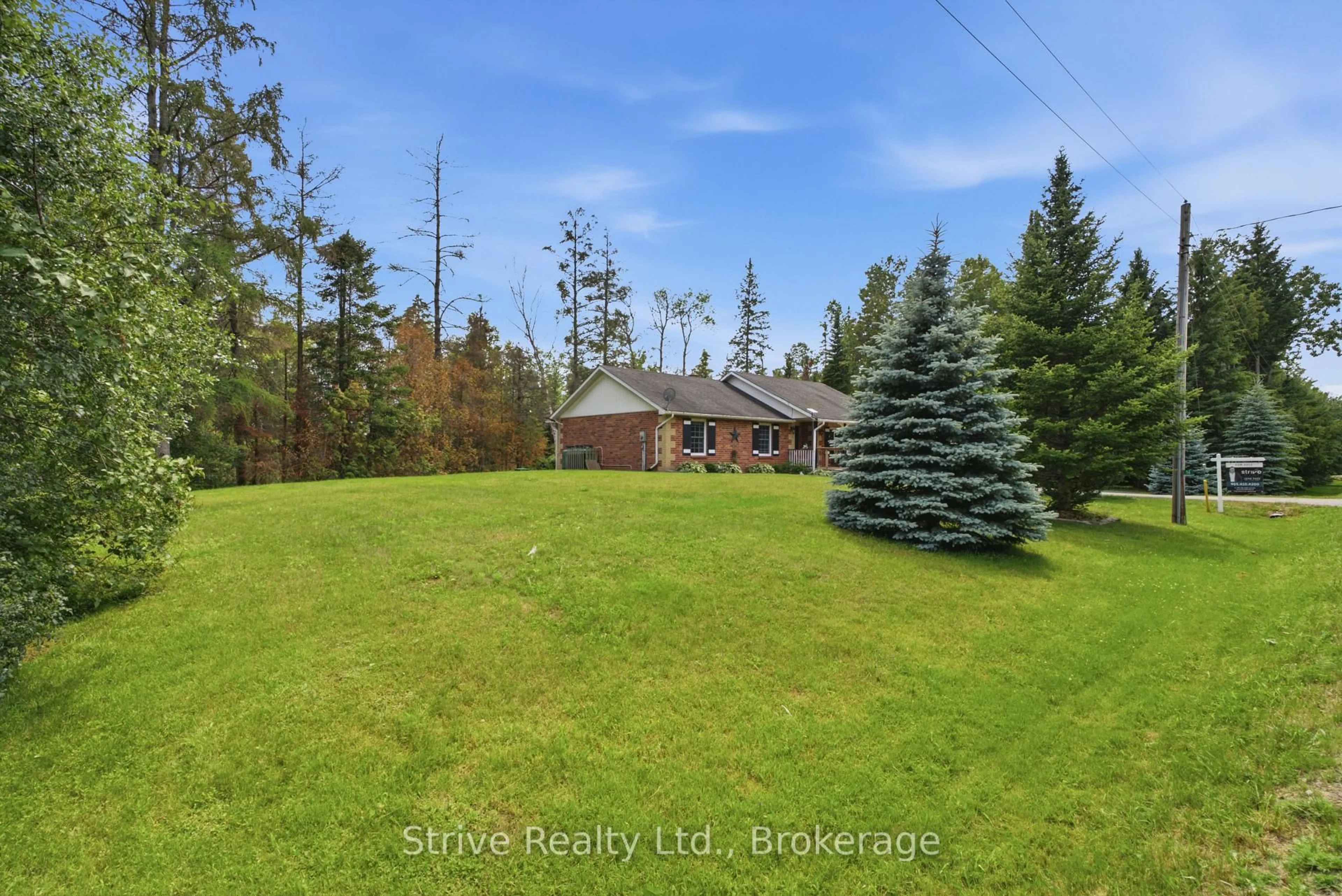 A pic from outside/outdoor area/front of a property/back of a property/a pic from drone, forest/trees view for 14 Manvers Station Rd, Kawartha Lakes Ontario L0A 1K0
