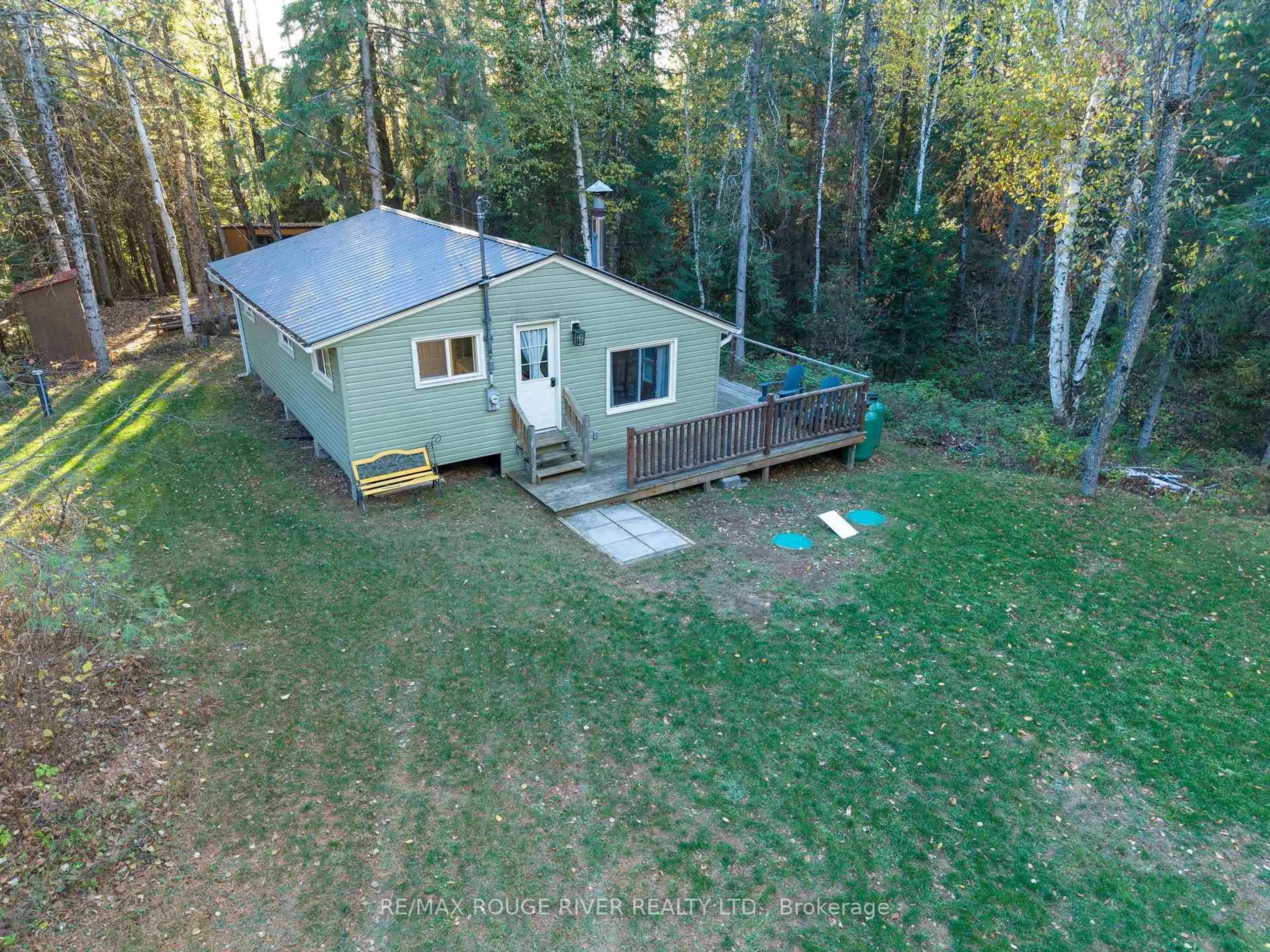 A pic from outside/outdoor area/front of a property/back of a property/a pic from drone, forest/trees view for 23 Egan Lane, Bancroft Ontario K0L 2L0