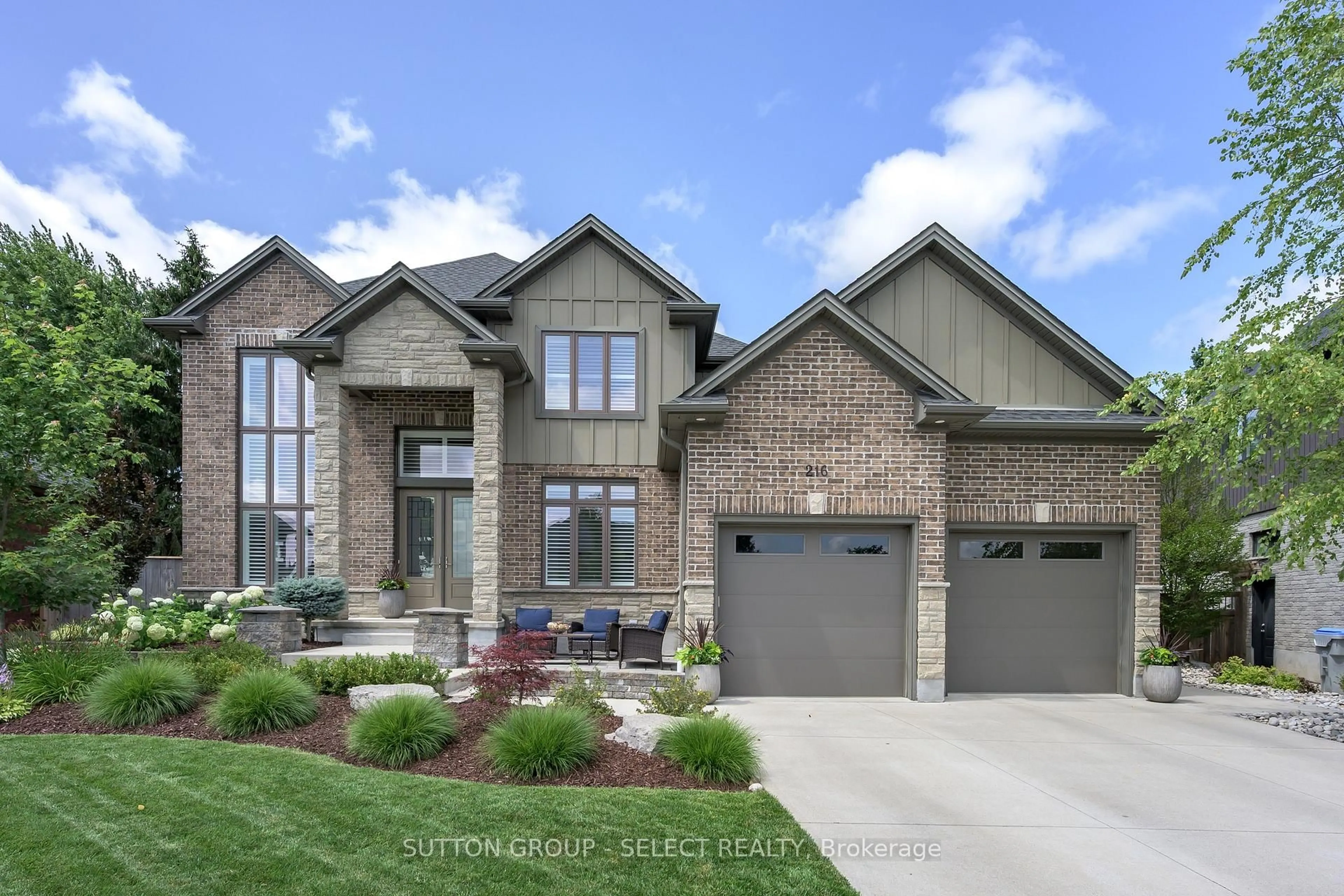 Home with brick exterior material, street for 216 Martin Dr, Middlesex Centre Ontario N0M 2A0