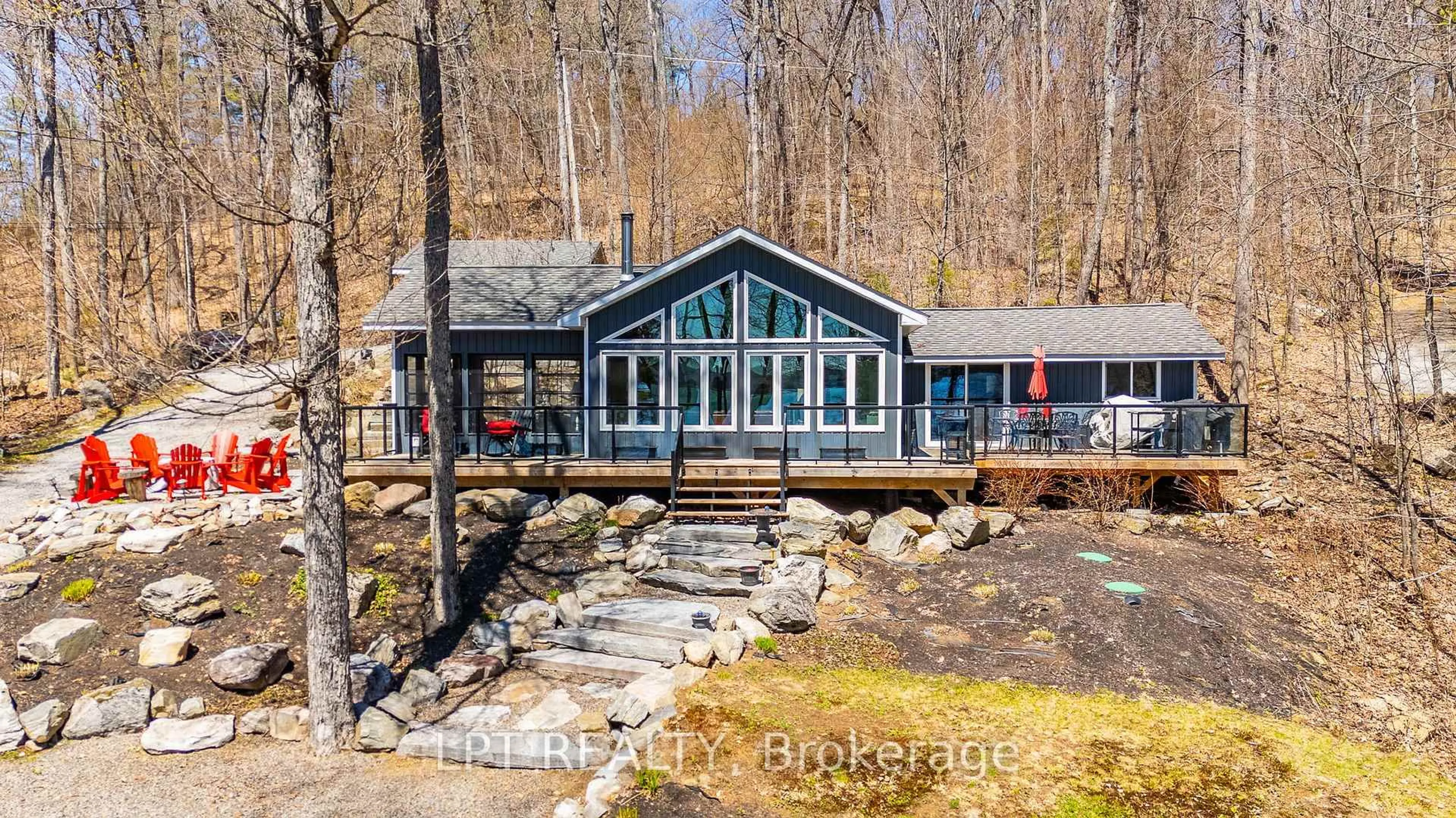 A pic from outside/outdoor area/front of a property/back of a property/a pic from drone, water/lake/river/ocean view for 1369 Hipkiss Dr, Dysart et al Ontario K0M 1S0