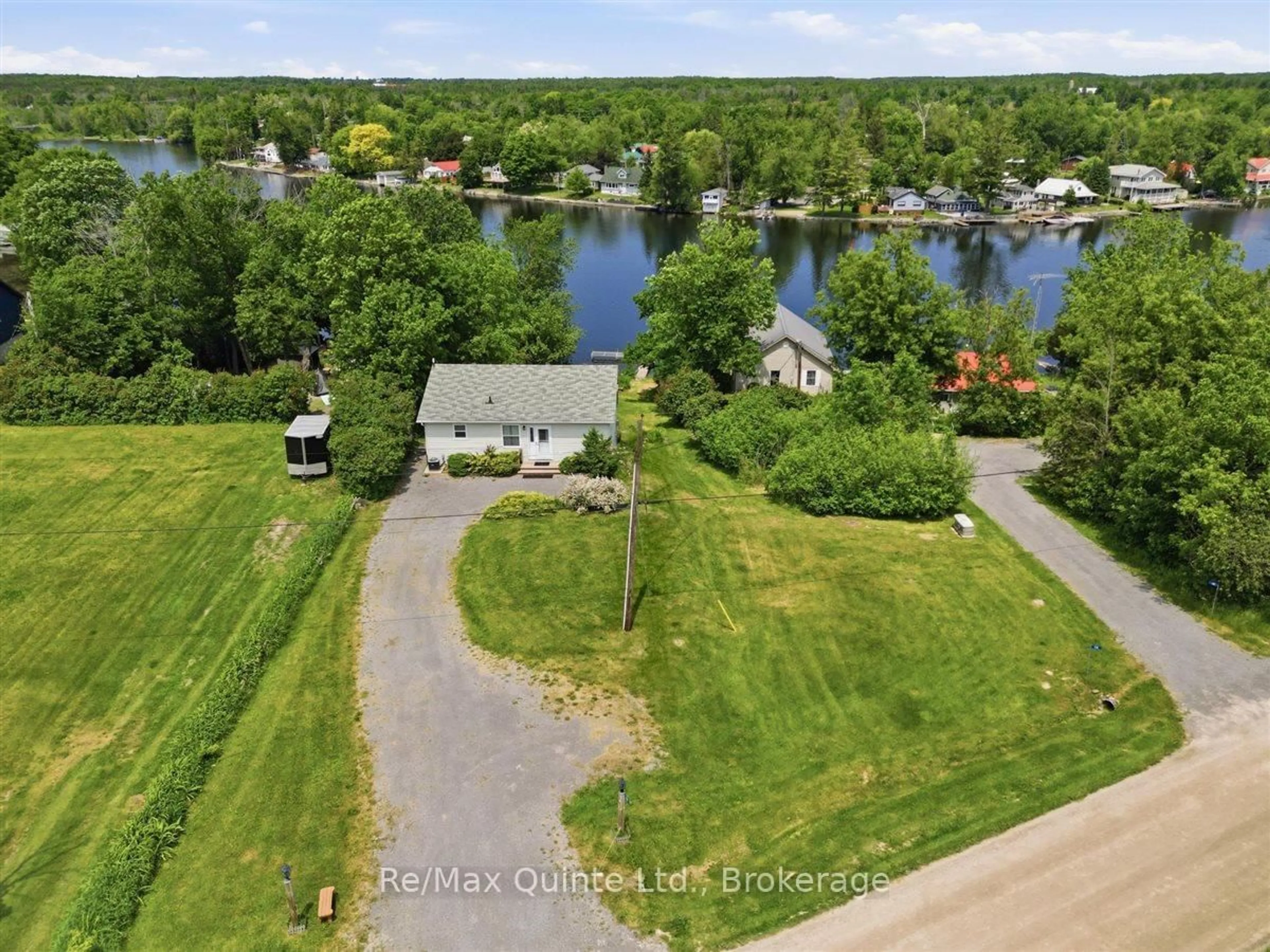 A pic from outside/outdoor area/front of a property/back of a property/a pic from drone, water/lake/river/ocean view for 54 Centennial Lane, Trent Hills Ontario K0L 2Z0