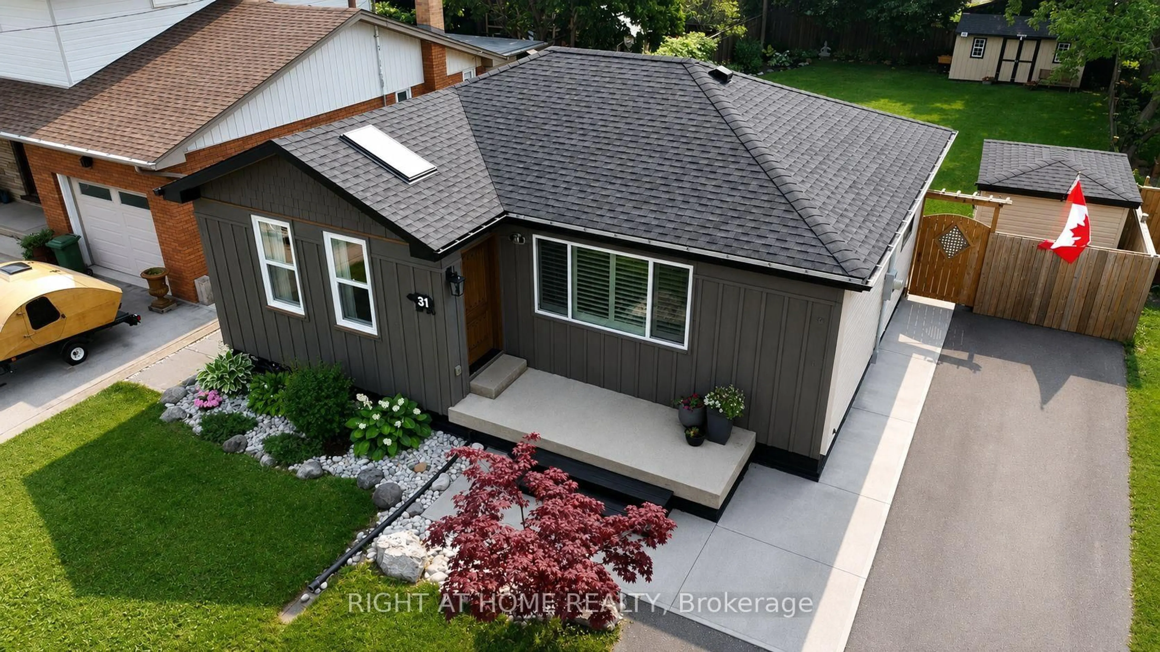 A pic from outside/outdoor area/front of a property/back of a property/a pic from drone, street for 31 Dorothy St, Hamilton Ontario L9A 3N9