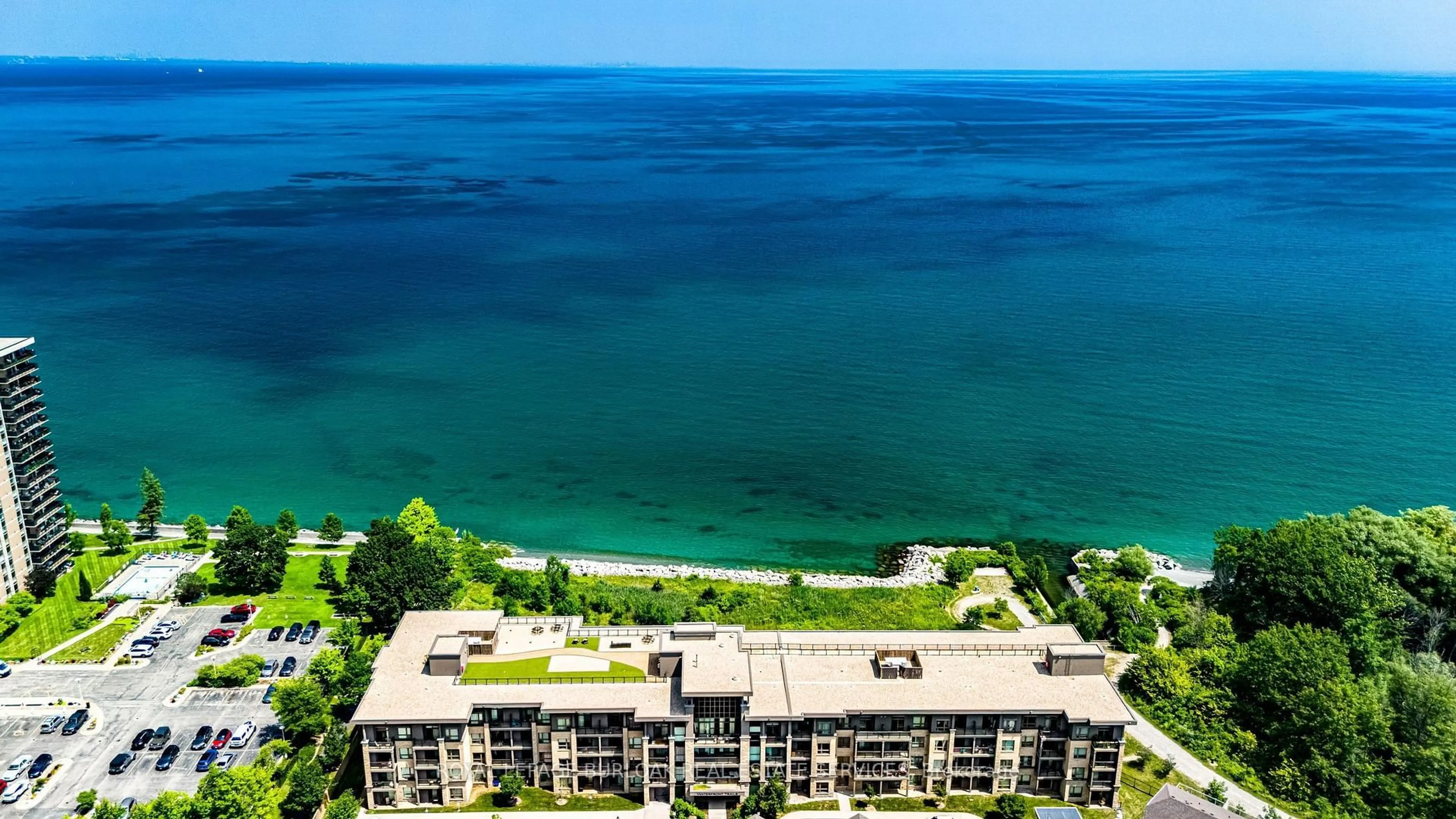 A pic from outside/outdoor area/front of a property/back of a property/a pic from drone, water/lake/river/ocean view for 35 Southshore Cres #221, Hamilton Ontario L8E 0J2