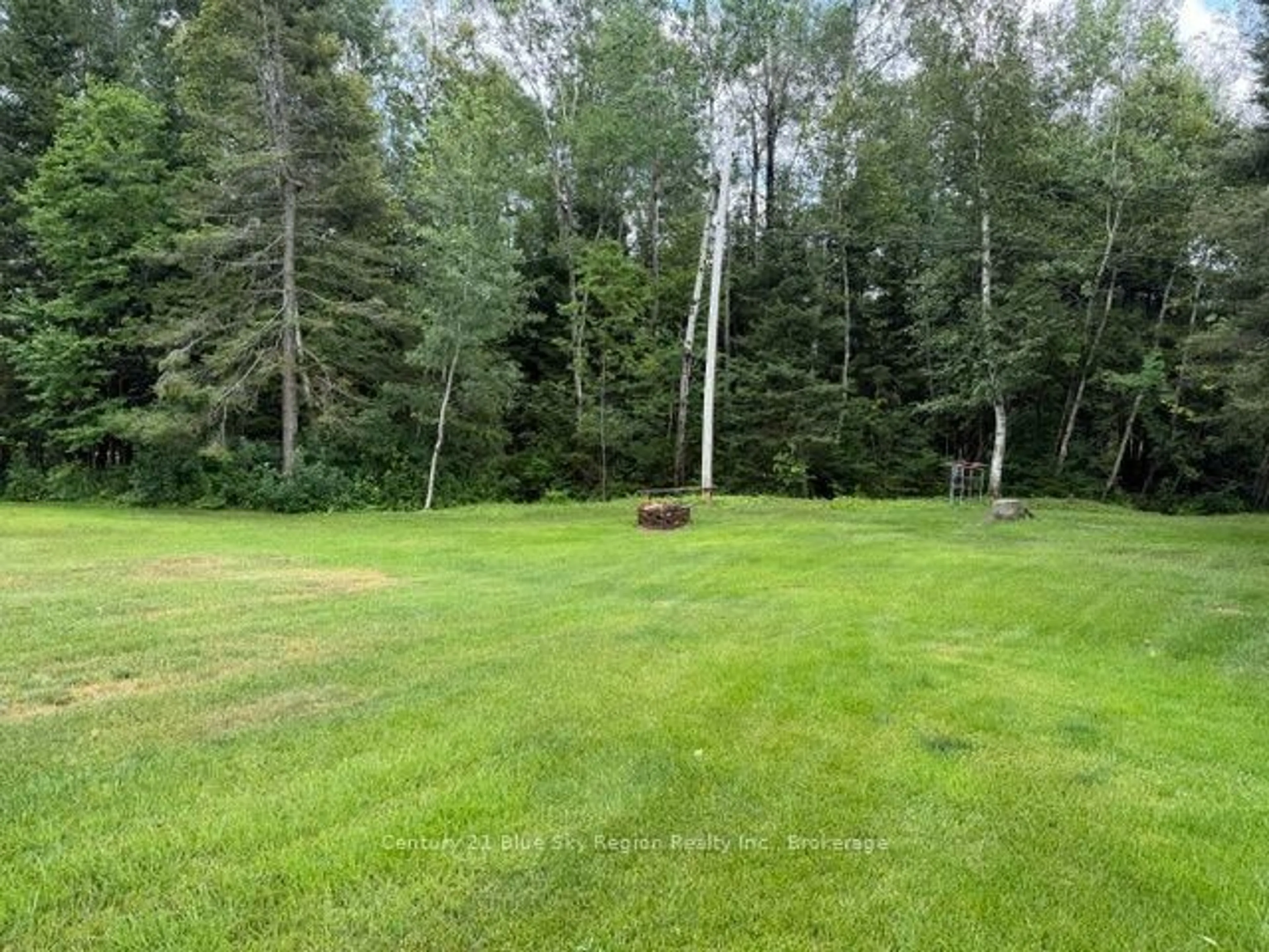 A pic from outside/outdoor area/front of a property/back of a property/a pic from drone, forest/trees view for 5377 Highway 11 N, North Bay Ontario P1B 8G3