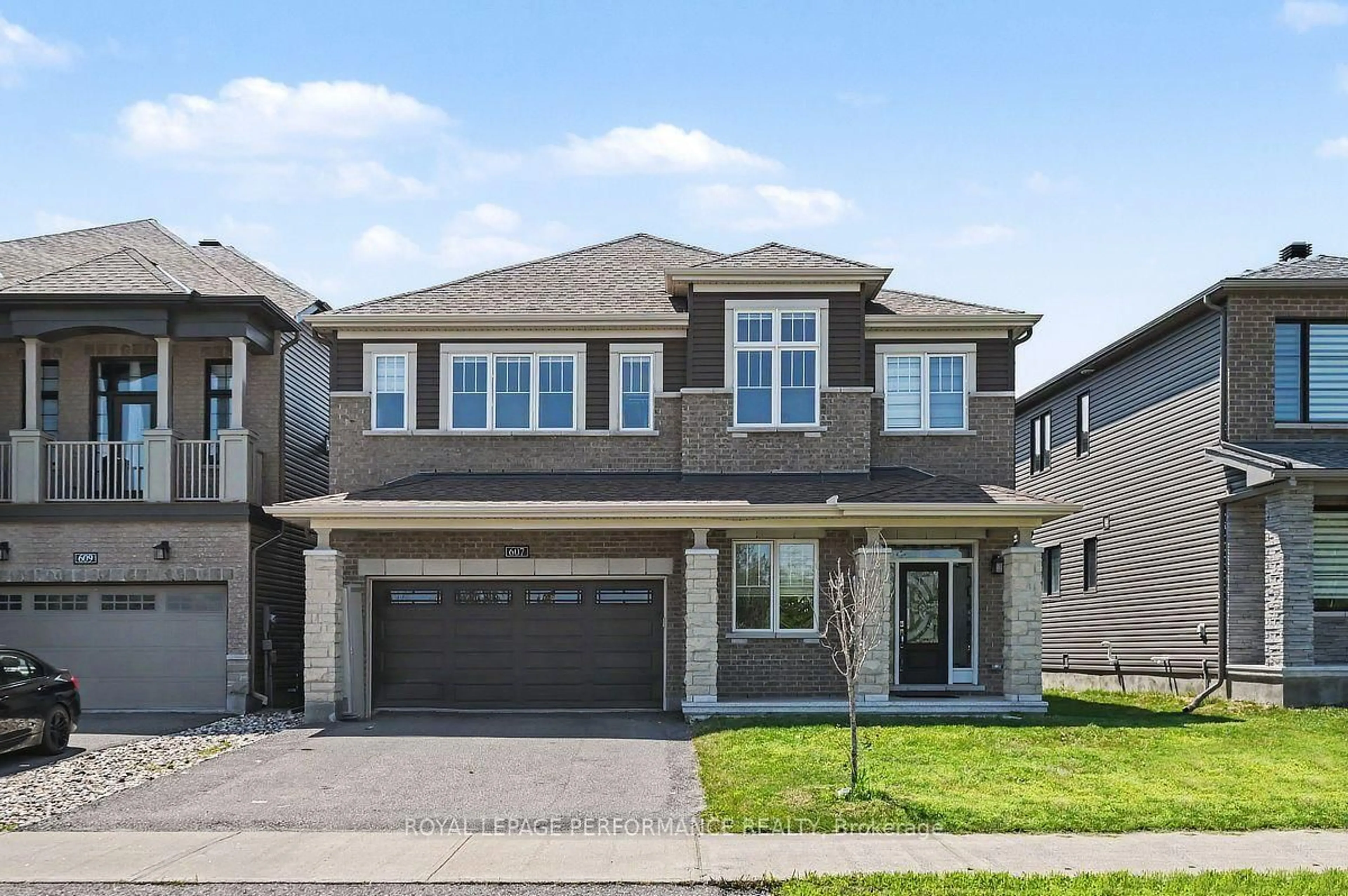 Home with brick exterior material, street for 607 Jerome Jodoin Dr, Ottawa Ontario K4A 1L1